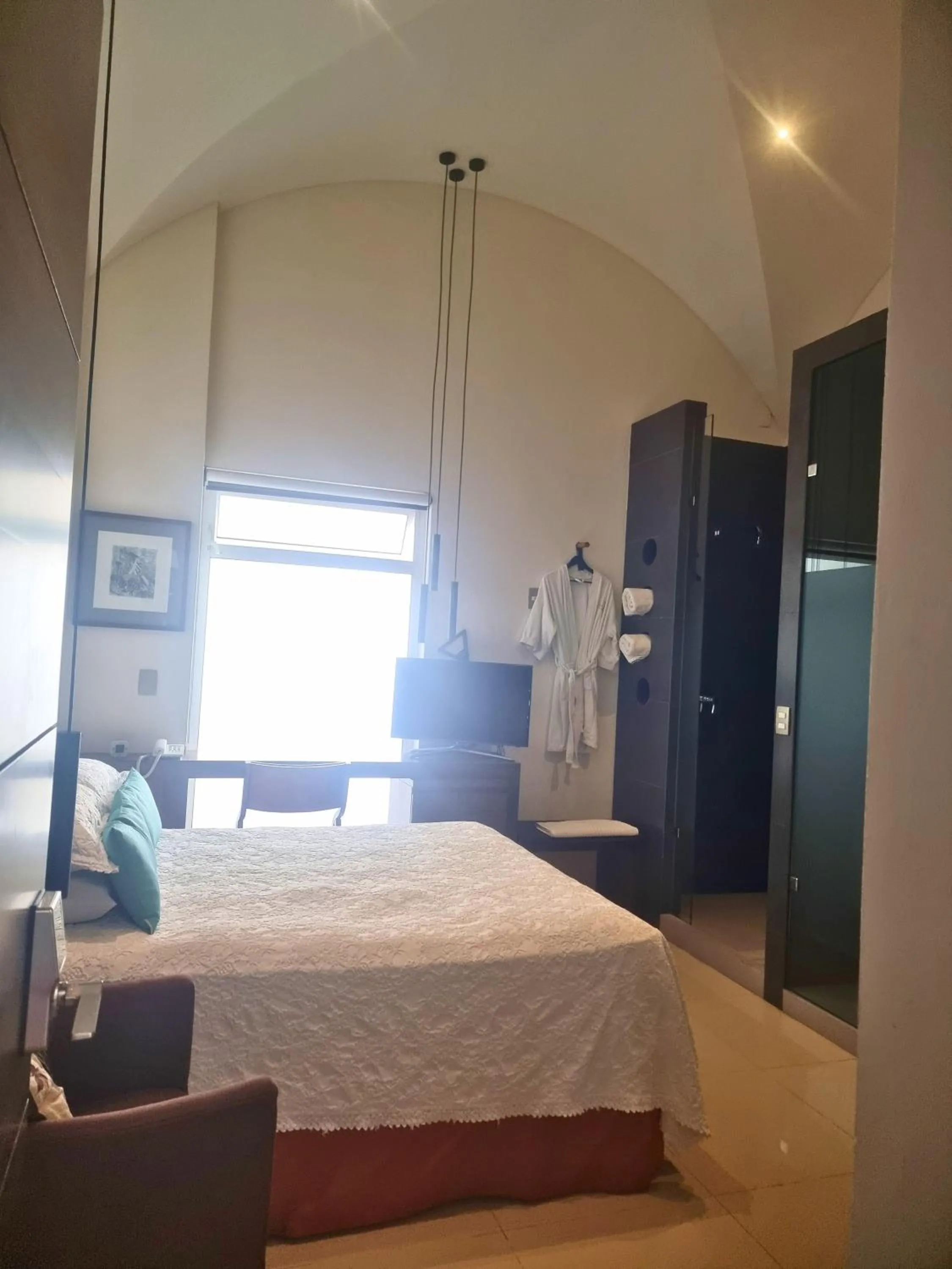 Photo of the whole room, Bed in Marialicia Suites, Hotel Boutique