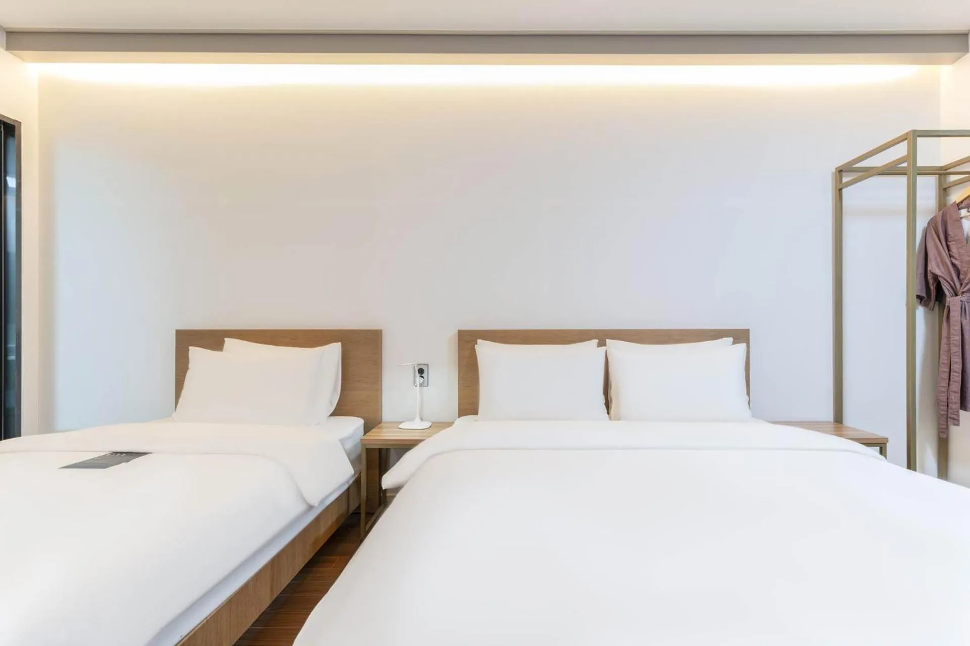 Bed in Hotel Deokyeong