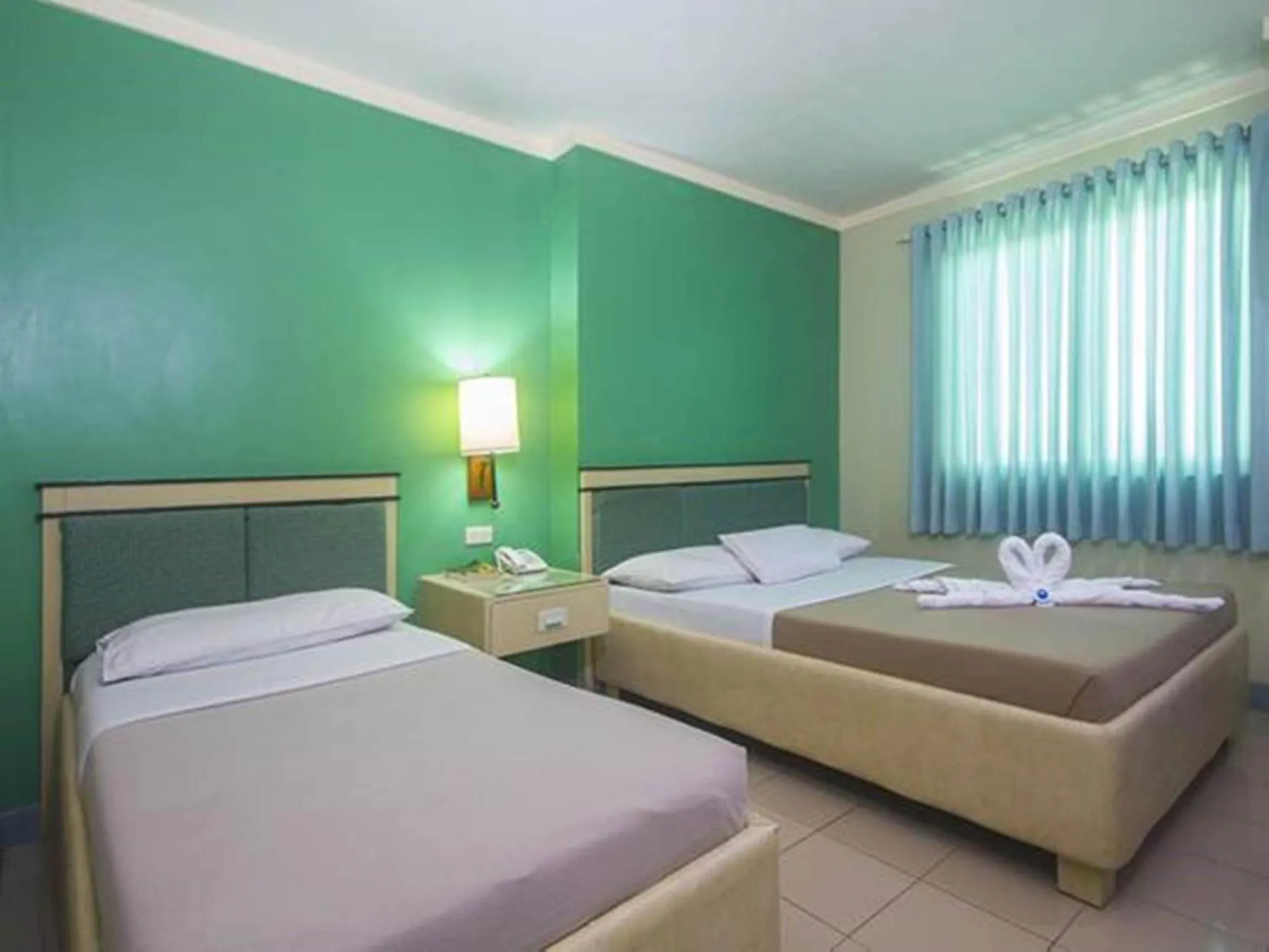 Bed in New Dawn Pensionne House