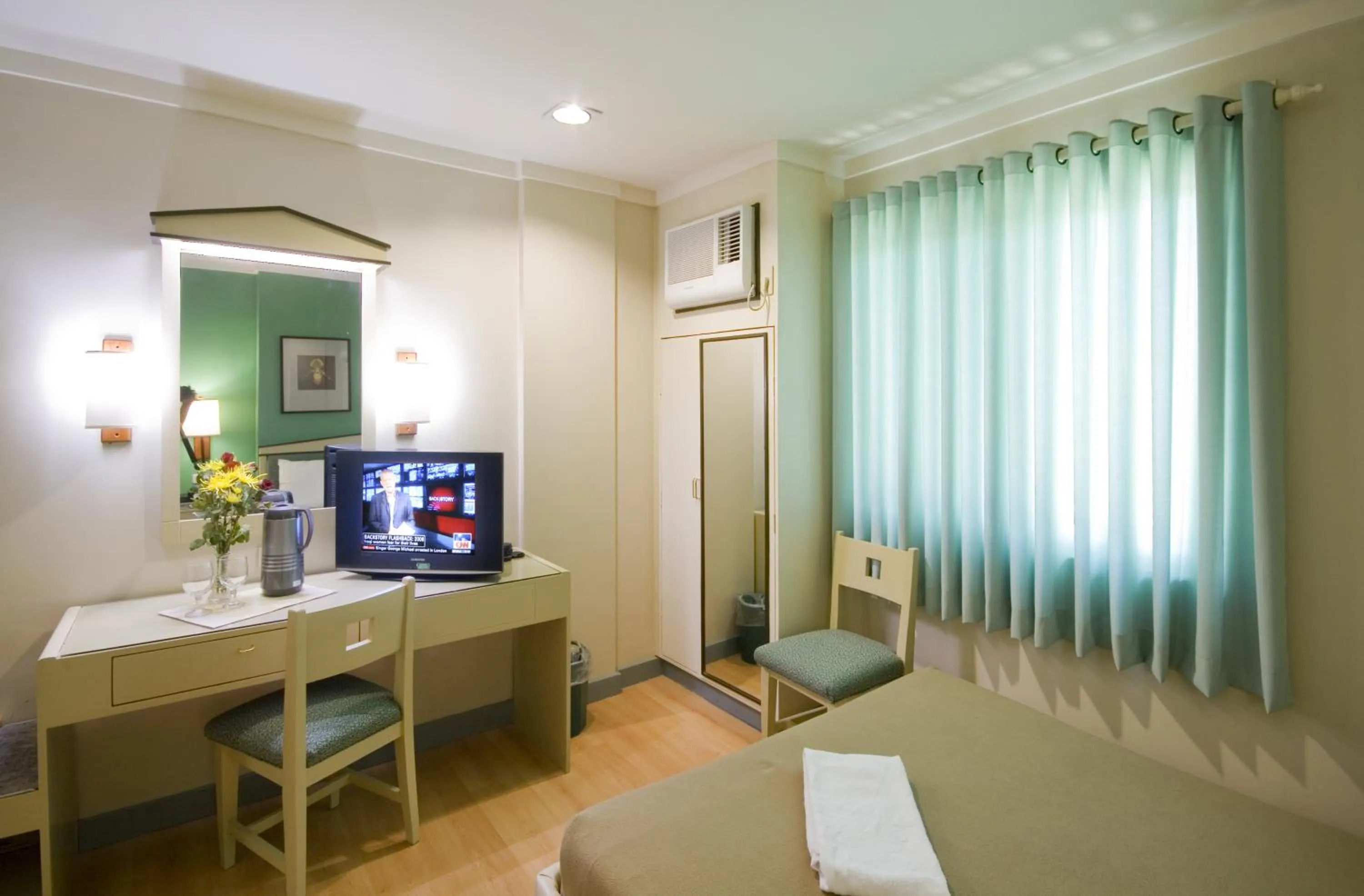 Bed in New Dawn Pensionne House