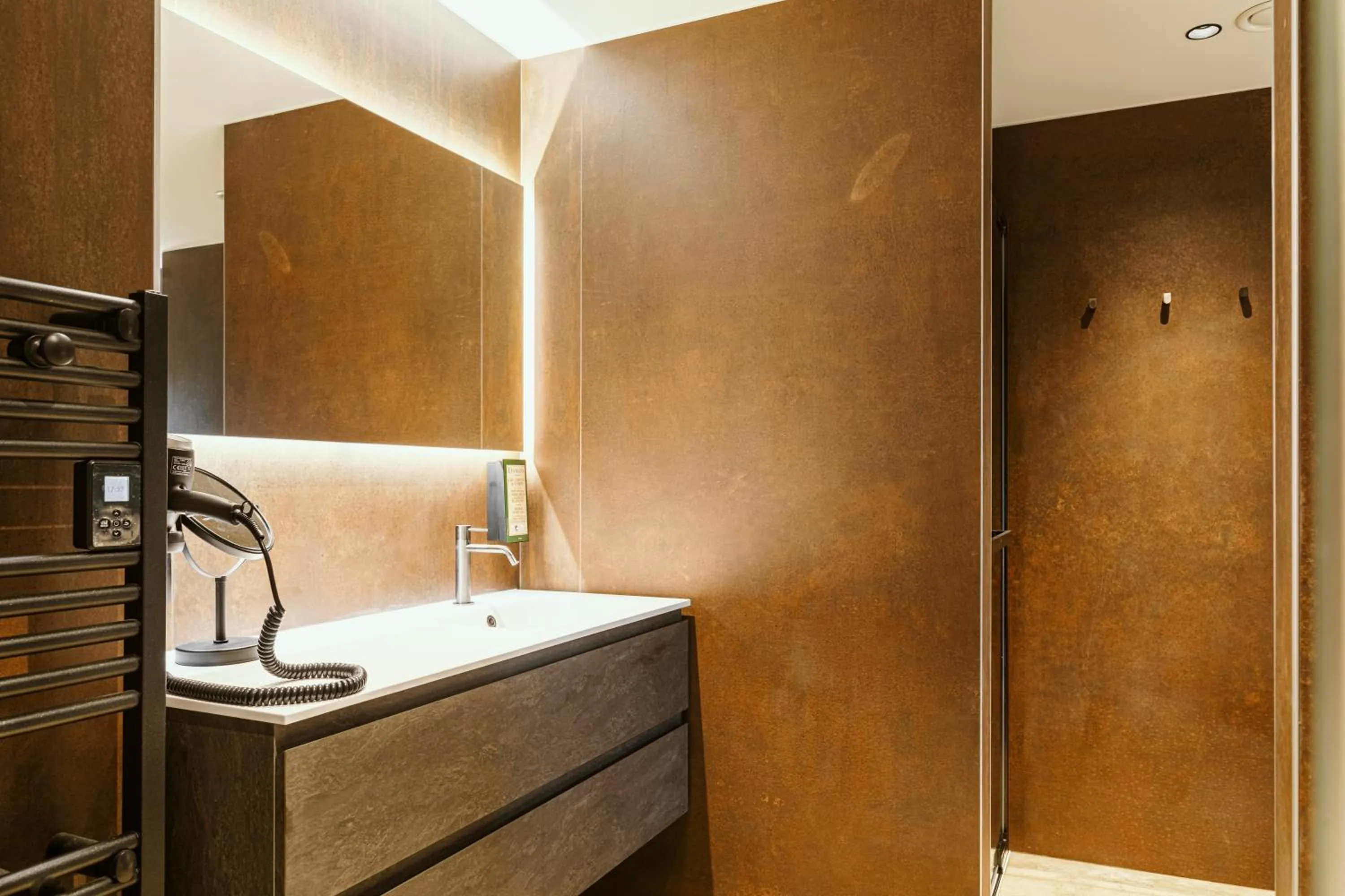 Bathroom in CC Nomie Hôtel Restaurant