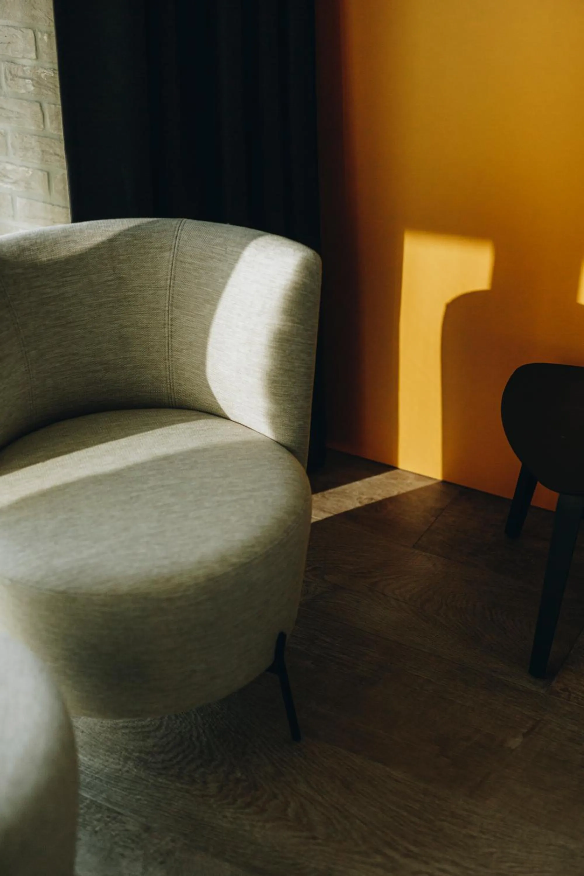 Seating area in CC Nomie Hôtel Restaurant