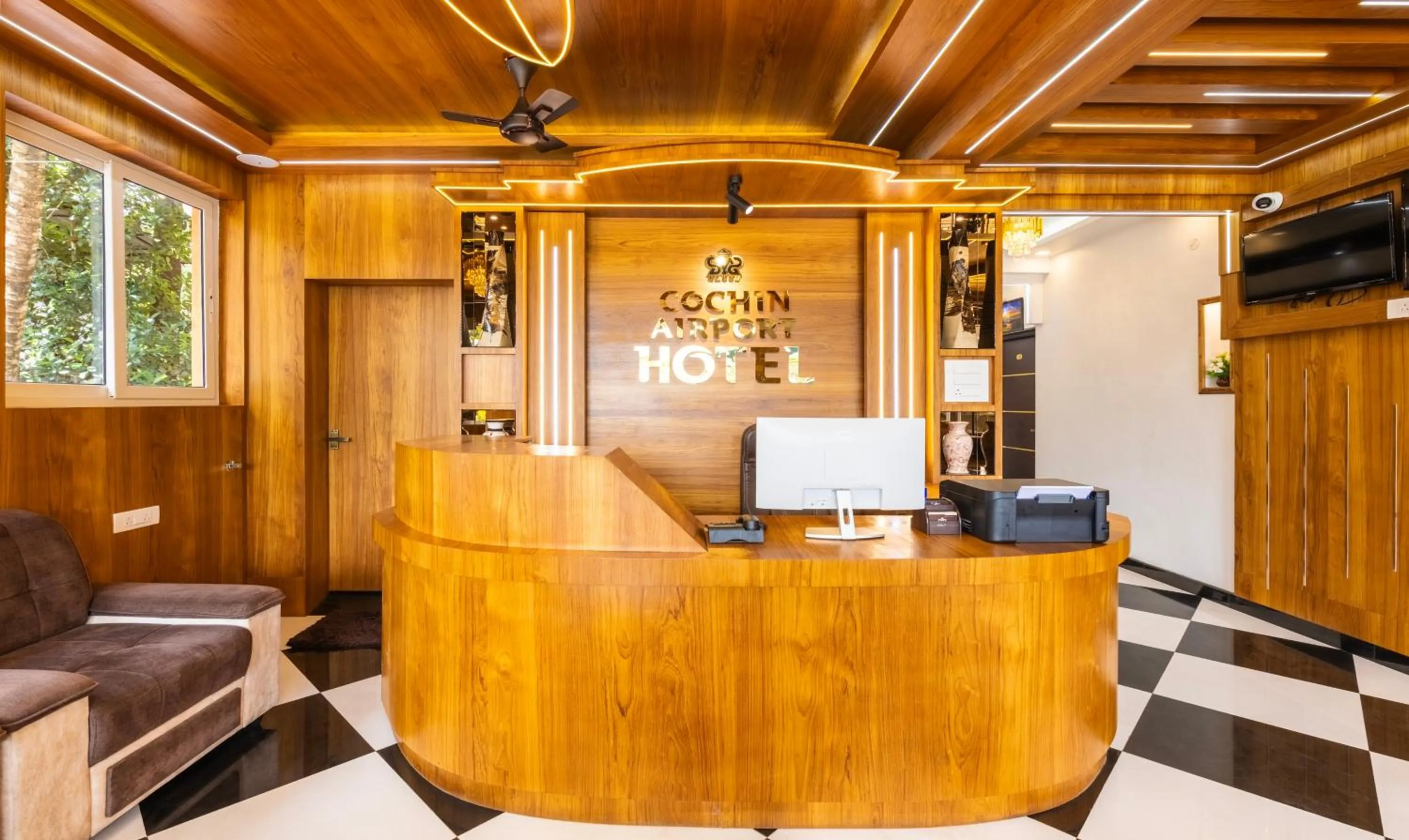 Lobby or reception in Treebo Premium Cochin Airport, 5 min From Cochin Airport