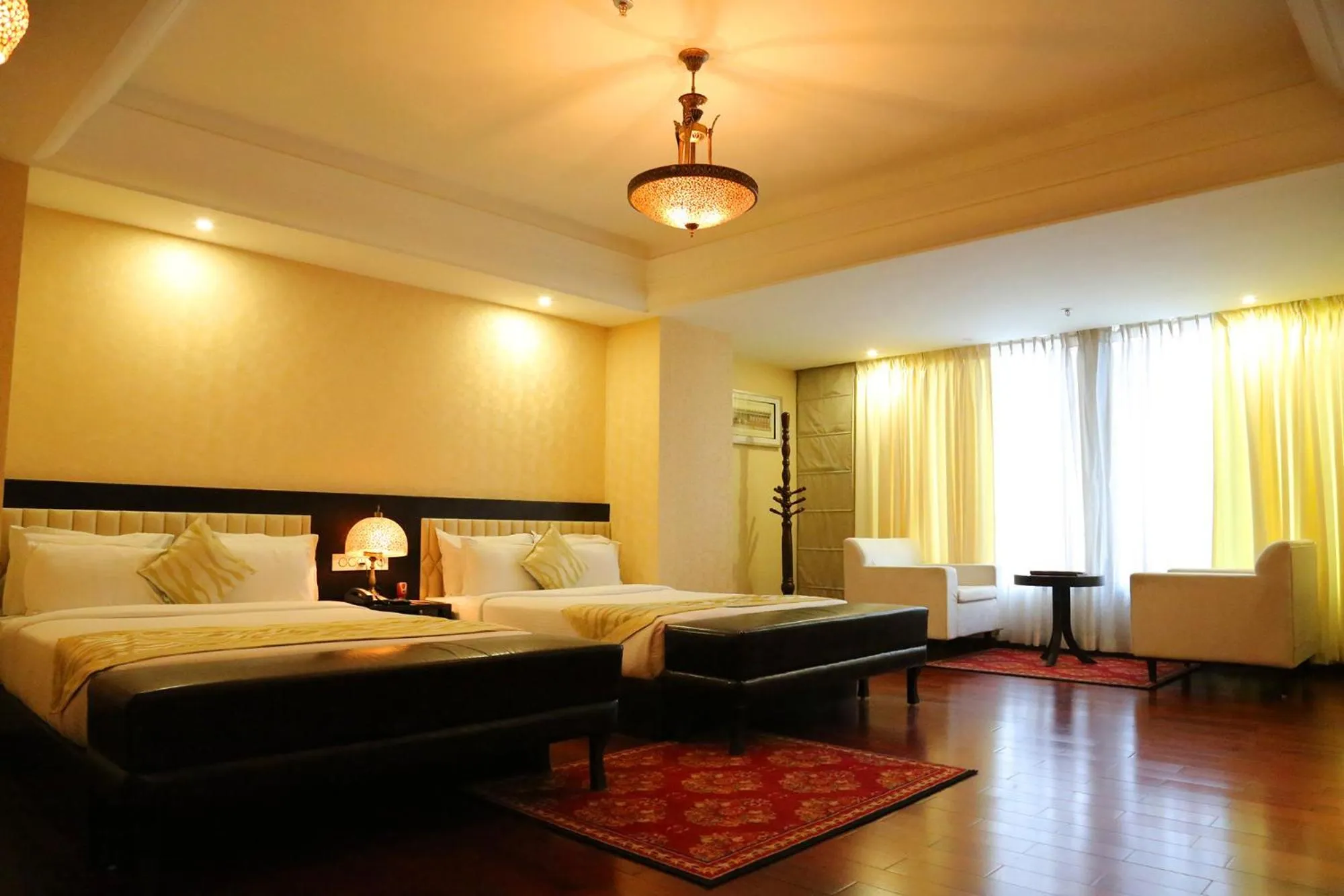 Bedroom, Bed in Hotel Trinity Grand, Raigarh