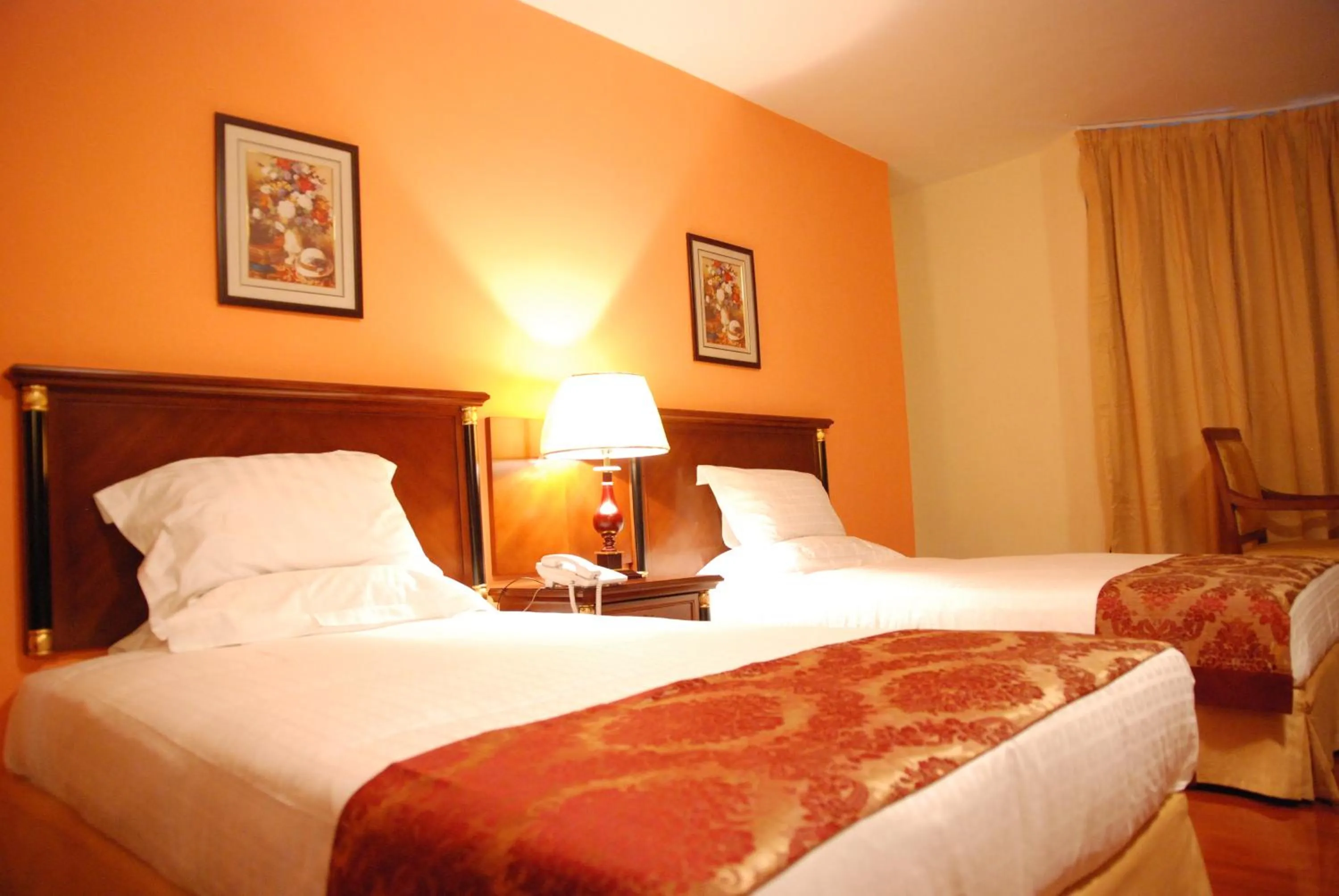 Bed in Churchill Addis Ababa Hotel