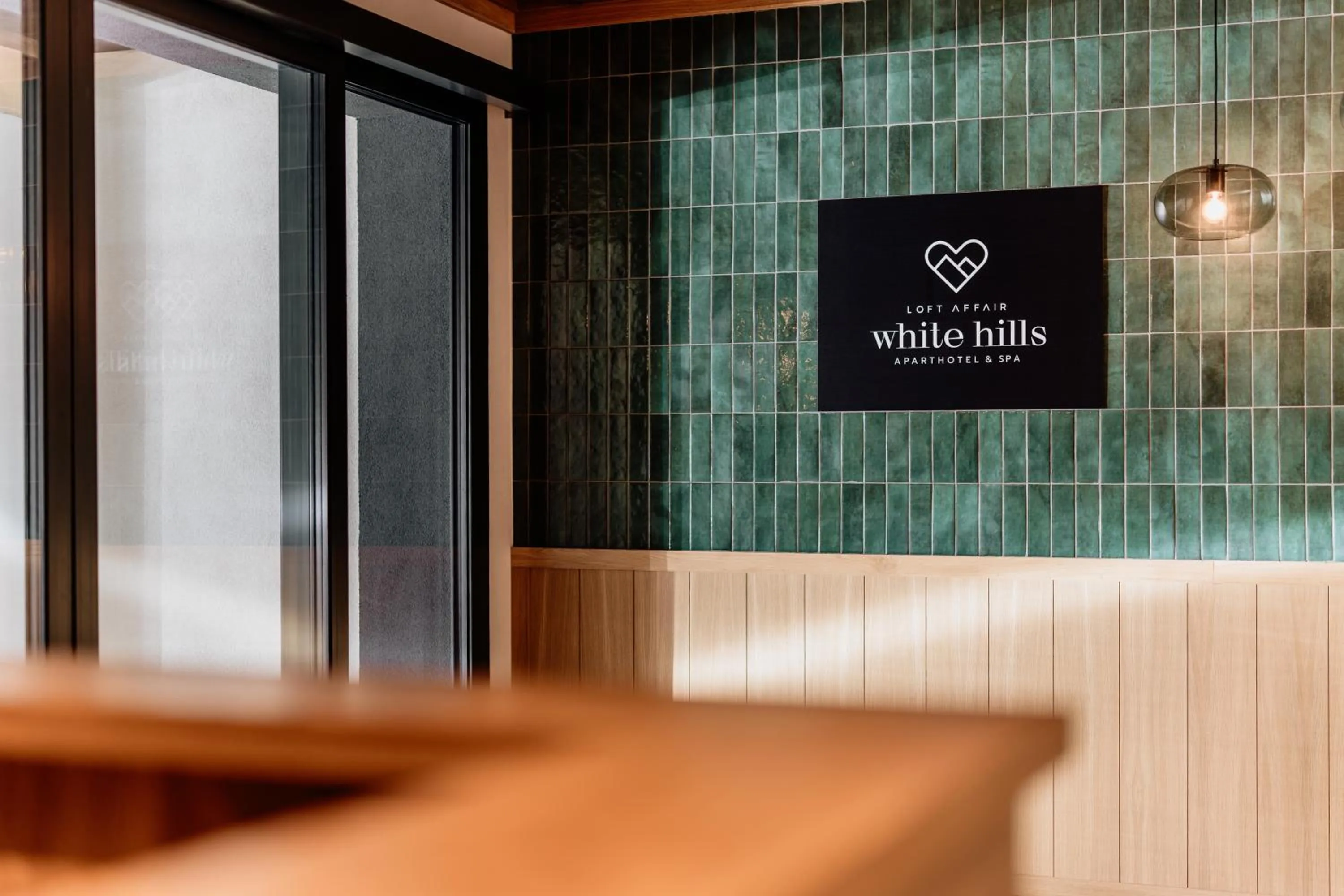 Property logo or sign in White Hills - LoftAffair Spa Collection