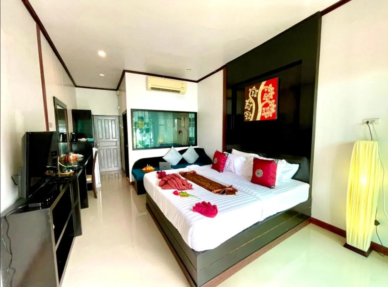 Bed in Kathalee Beach Resort & Spa