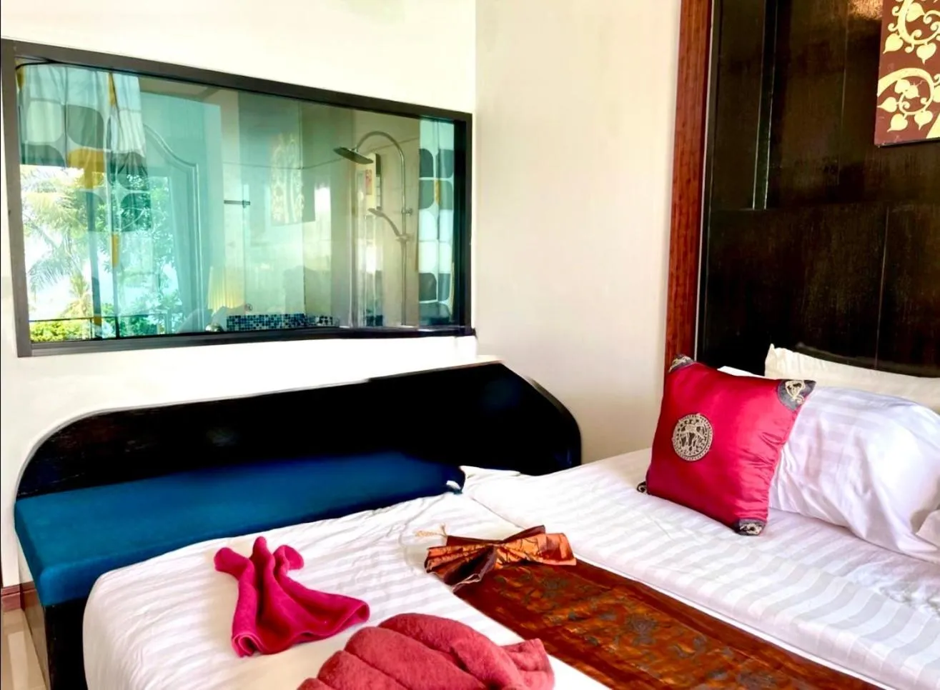 Bed in Kathalee Beach Resort & Spa