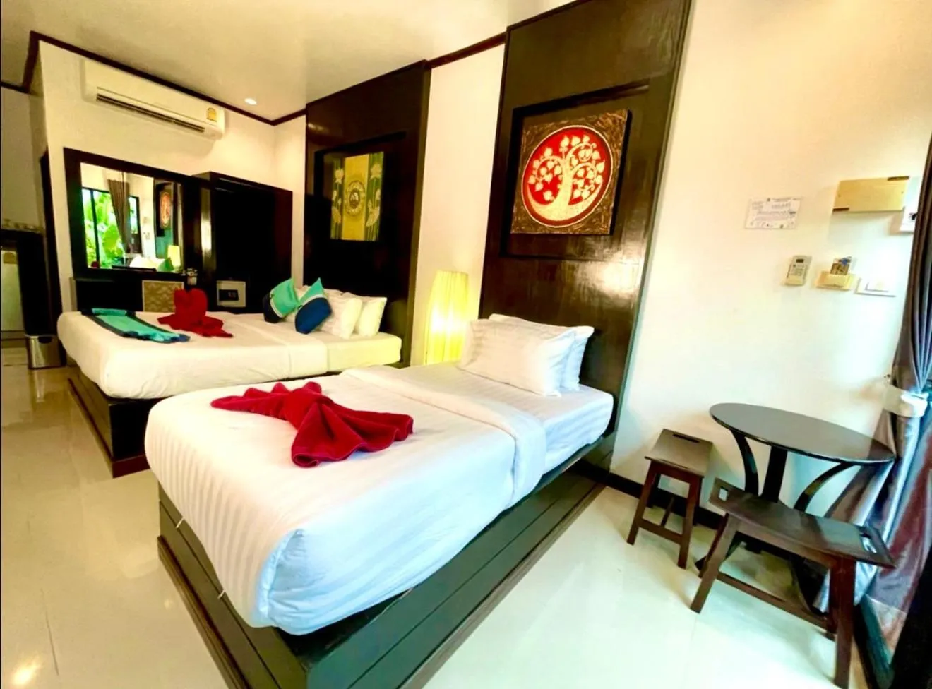 Bed in Kathalee Beach Resort & Spa
