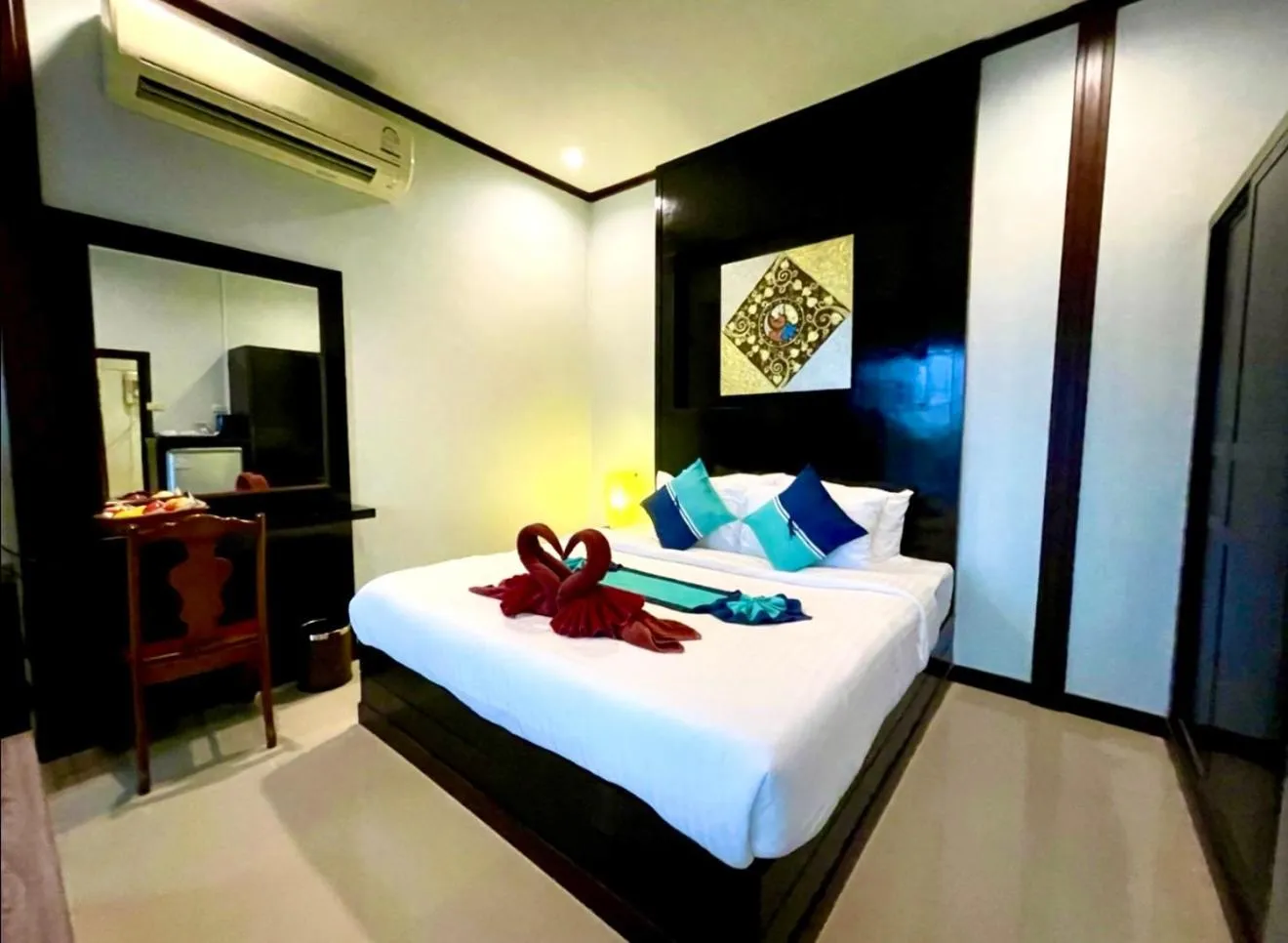 Bed in Kathalee Beach Resort & Spa