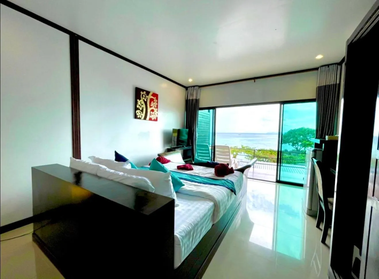 Bed in Kathalee Beach Resort & Spa