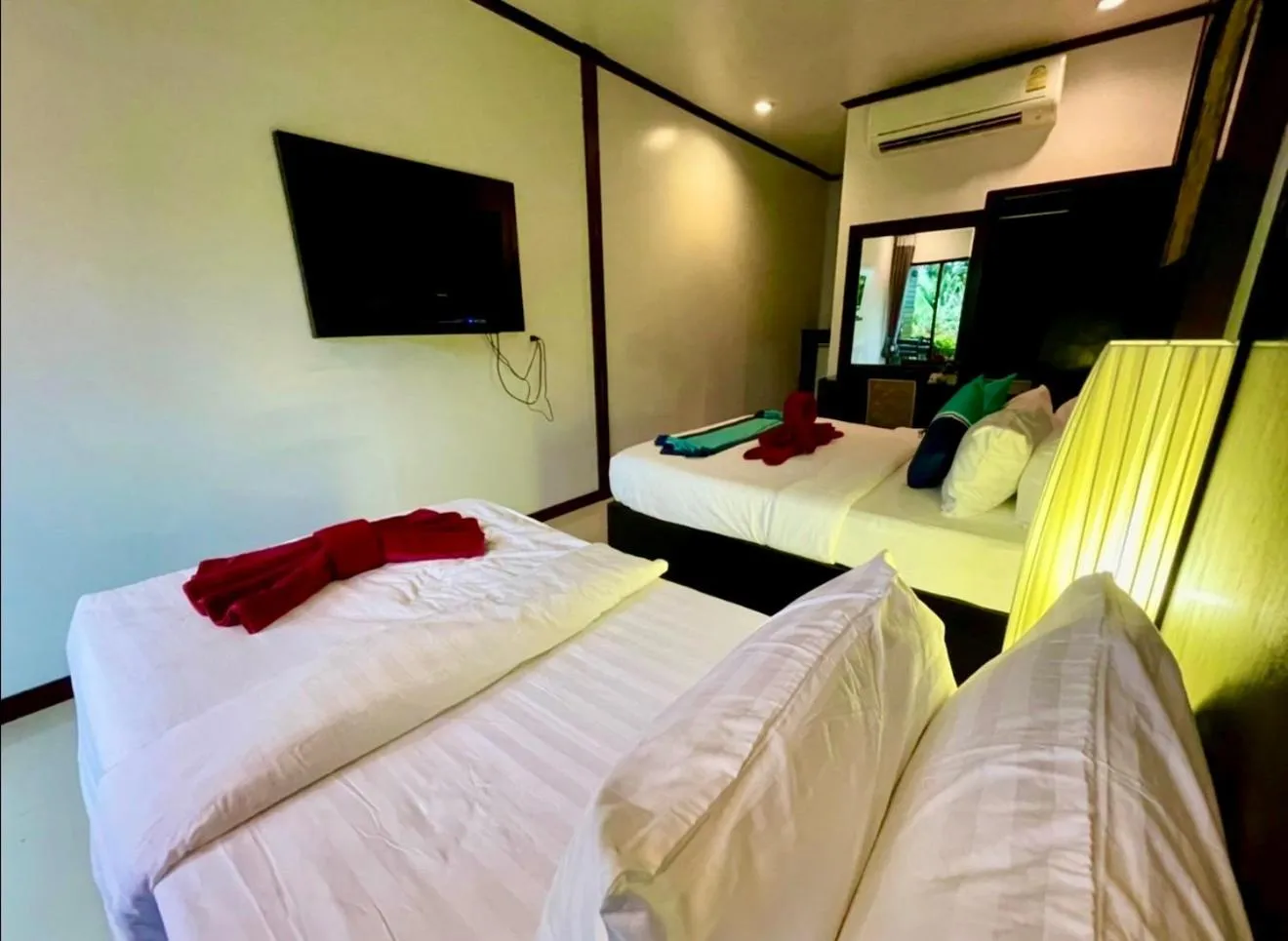 Bed in Kathalee Beach Resort & Spa