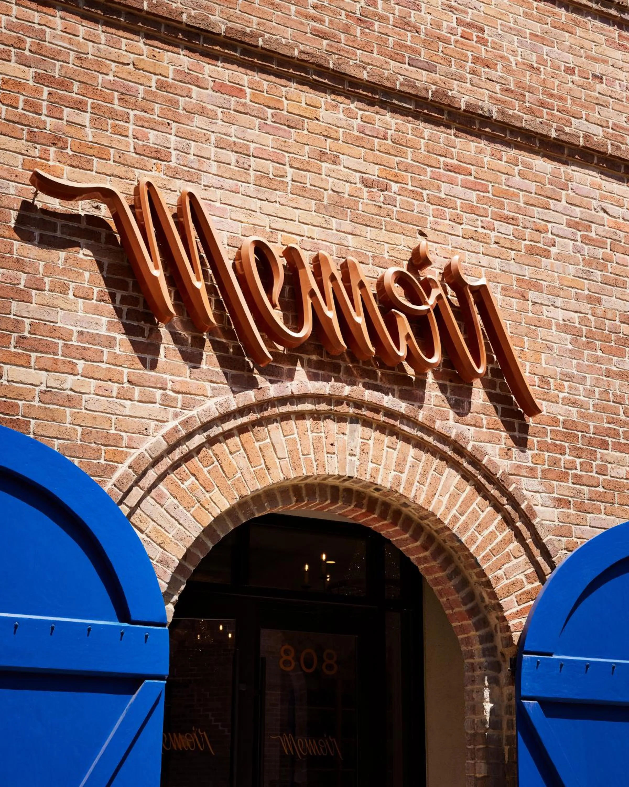 Property logo or sign in Memoir Warehouse District