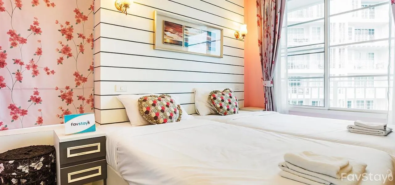 Bed in Summer Huahin Condo 2 Bedrooms Pool View Classic Room
