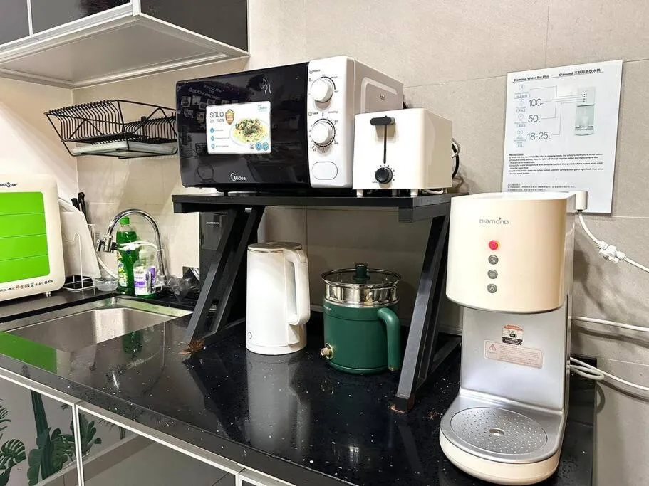 Kitchen or kitchenette in Unicorn Fairy Theme 2BR Airport Suite# Straits Intl# Pantai Hospt