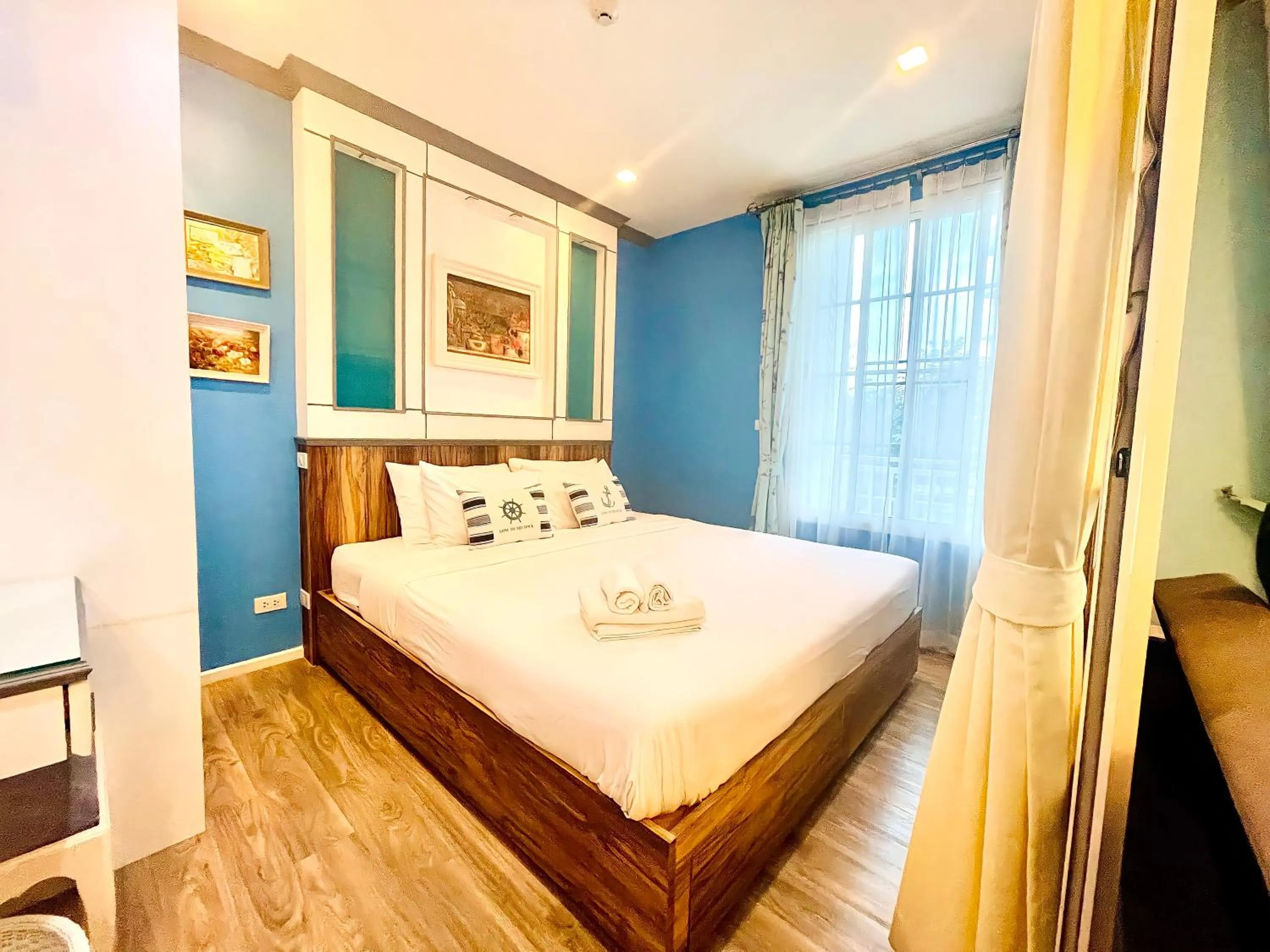 Bed in Summer Huahin Condo classic room pool view