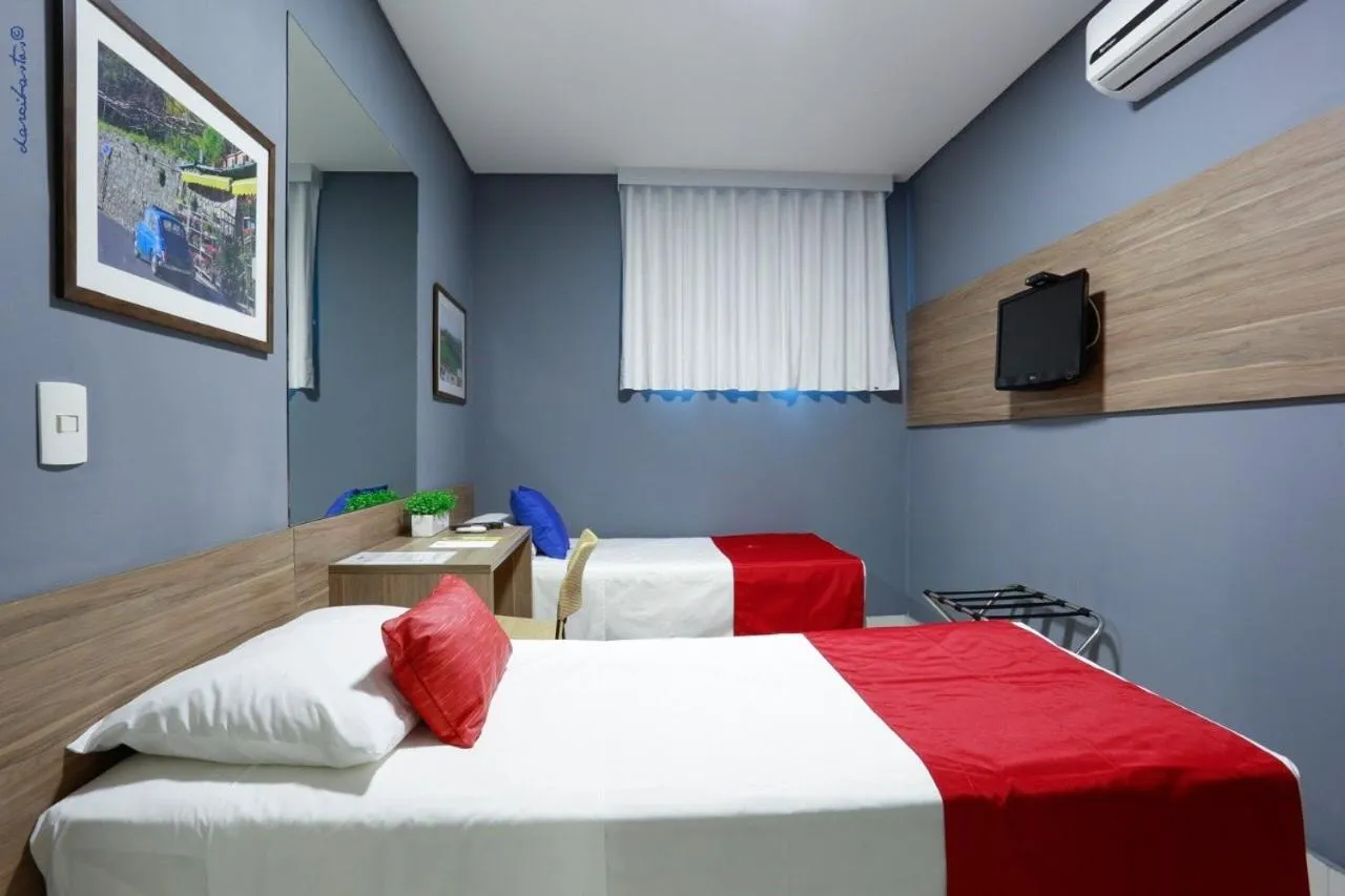 Bed in Portofino Hotel Prime