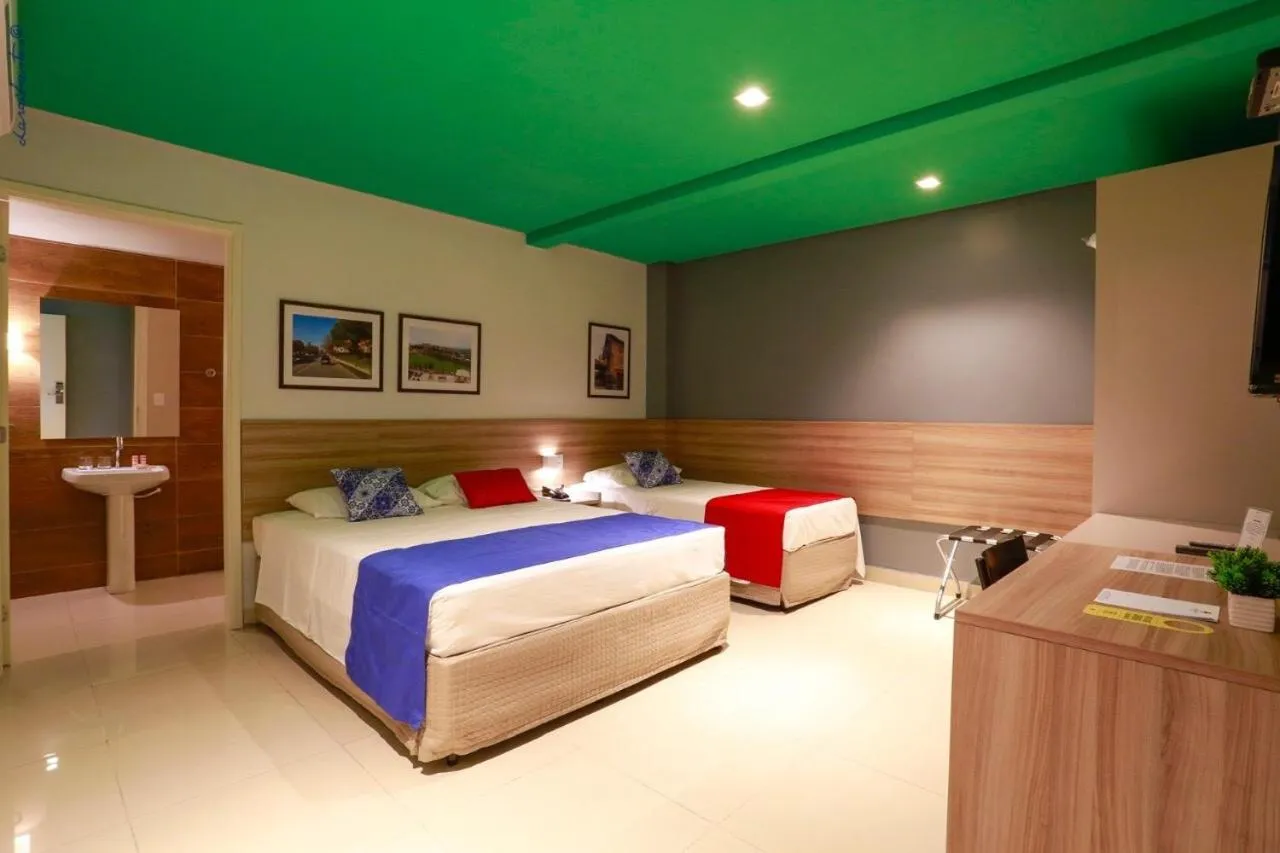 Bed in Portofino Hotel Prime