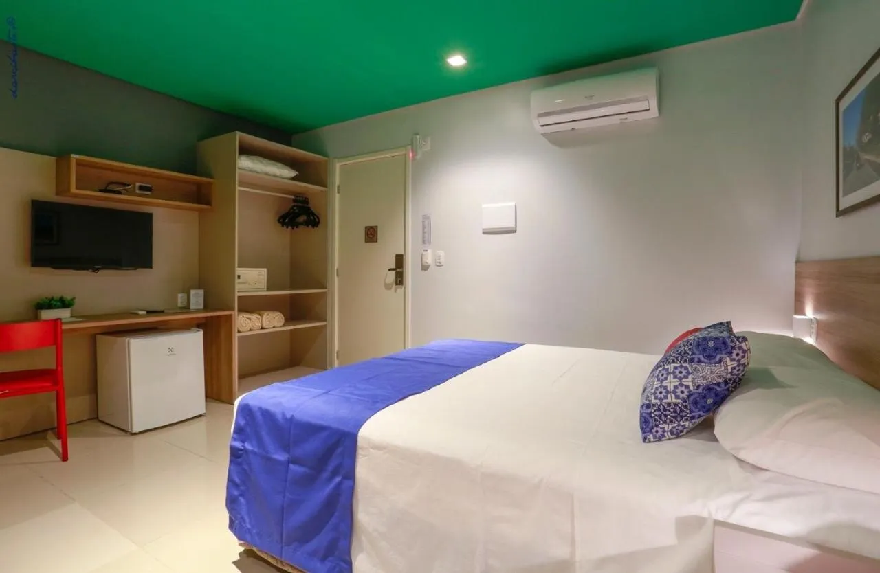 Bed in Portofino Hotel Prime