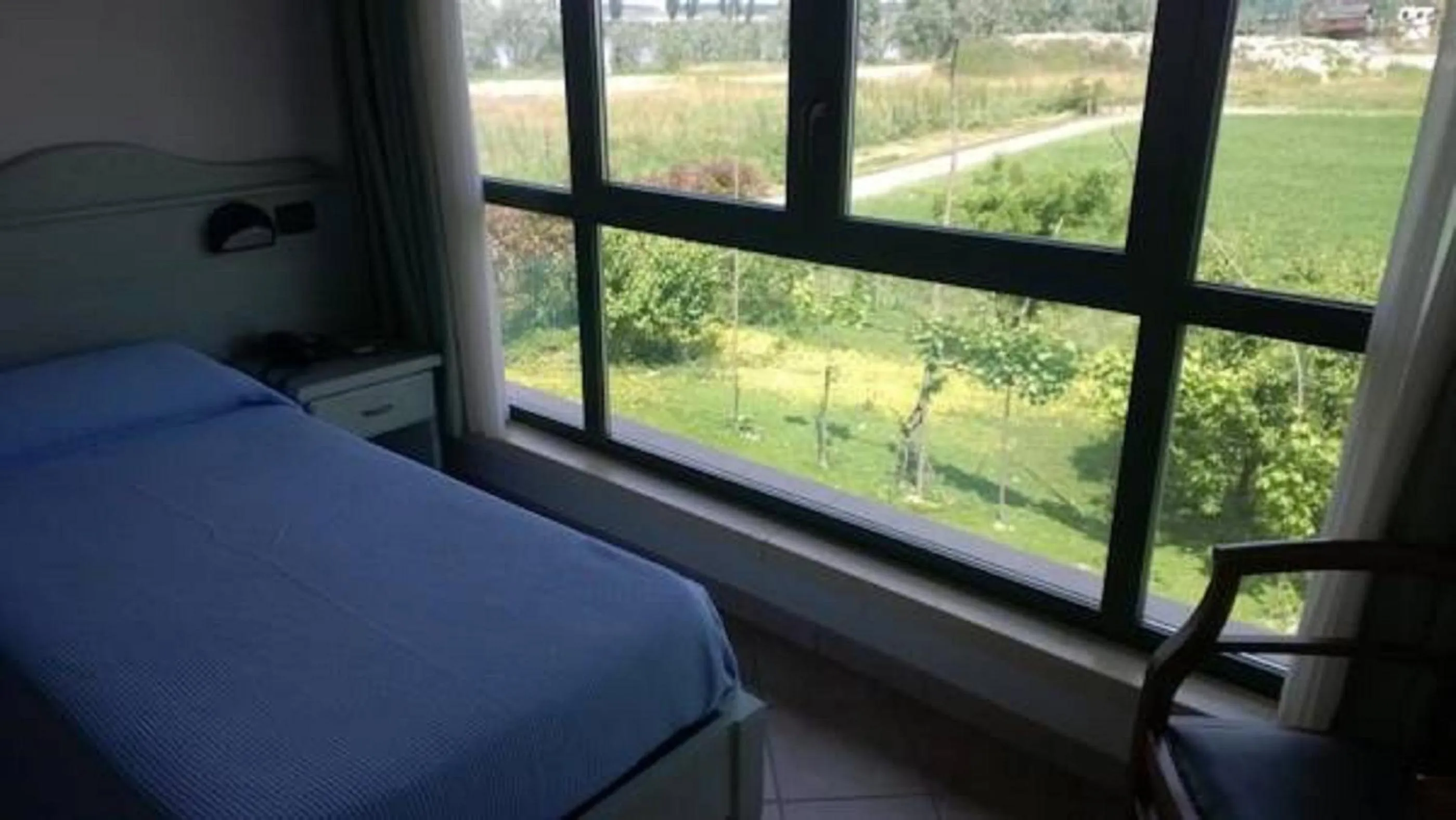 Garden view, Bed in Albergo del Po
