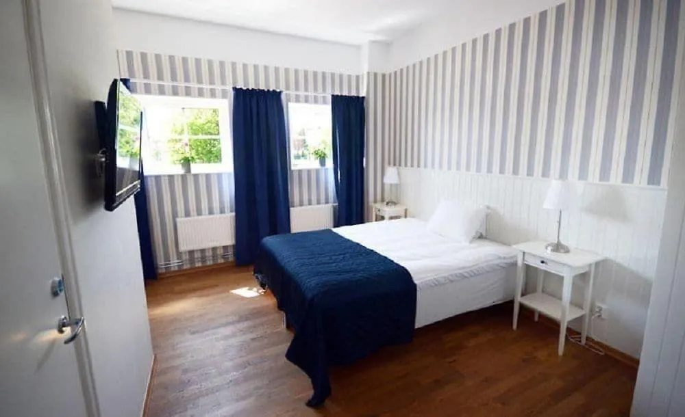 Bed in Badholmen Restaurang & Hotell