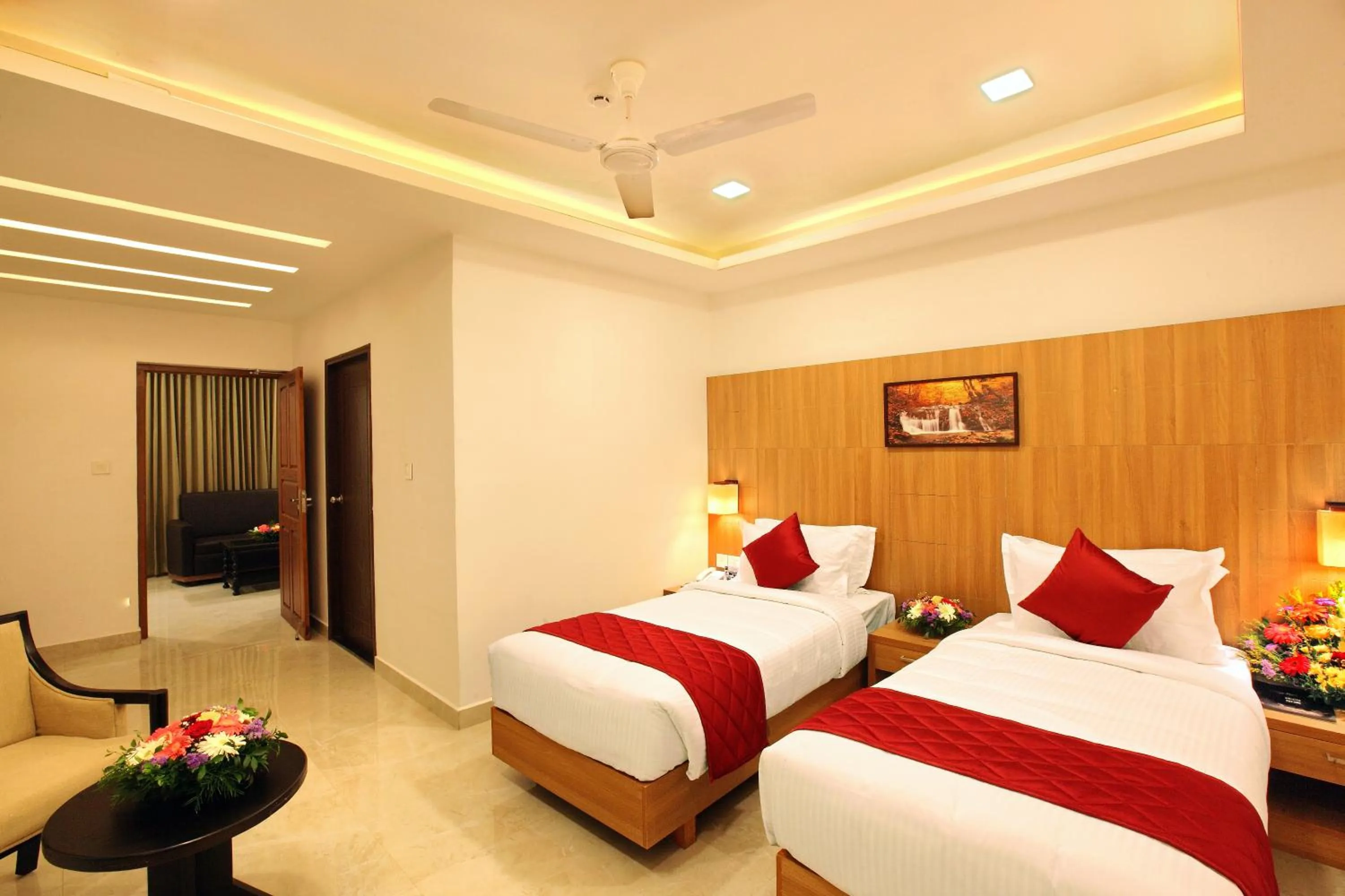 Seating area, Bed in Enkeys Residency