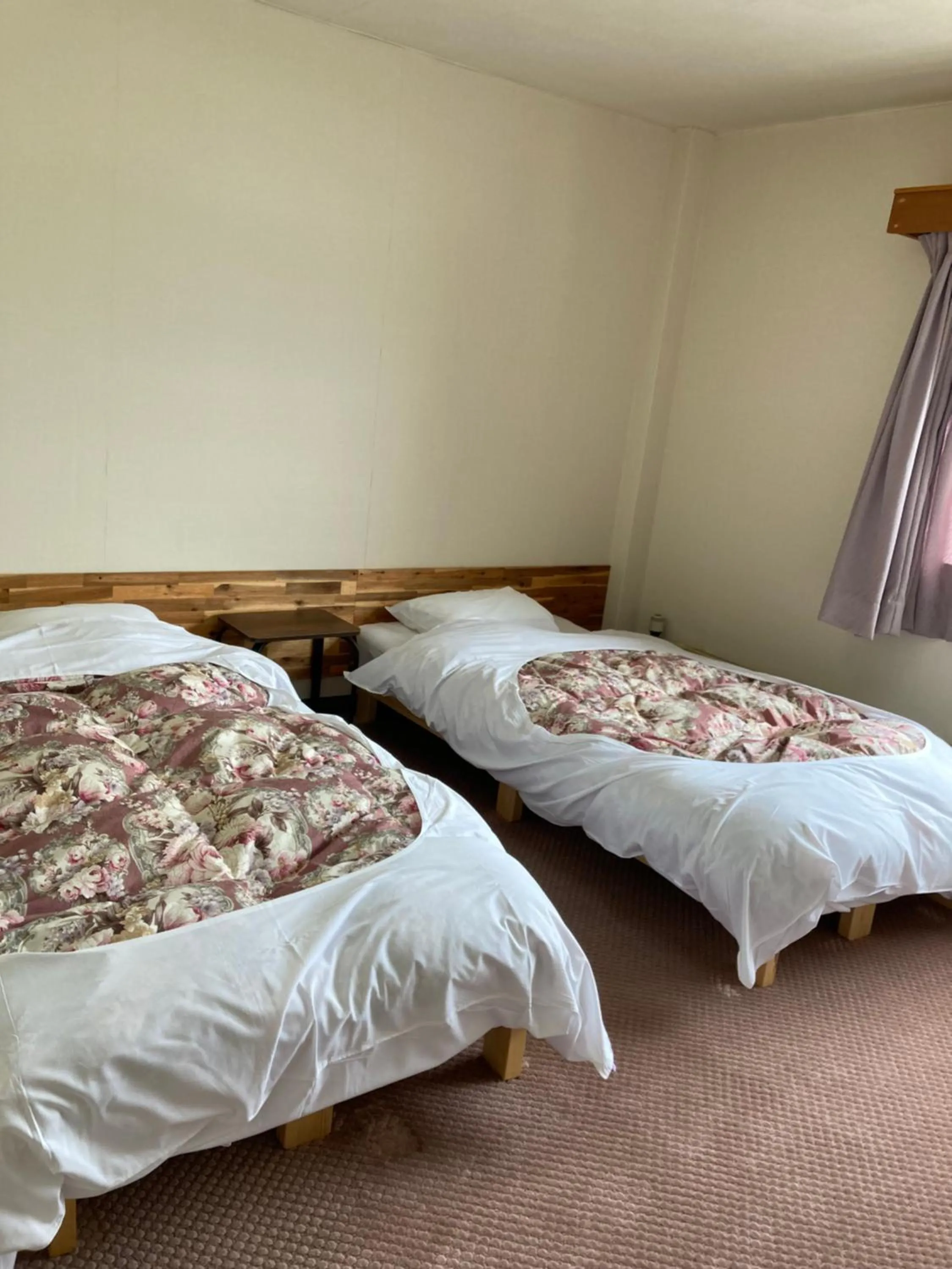 Bed in Resort Inn Seikan