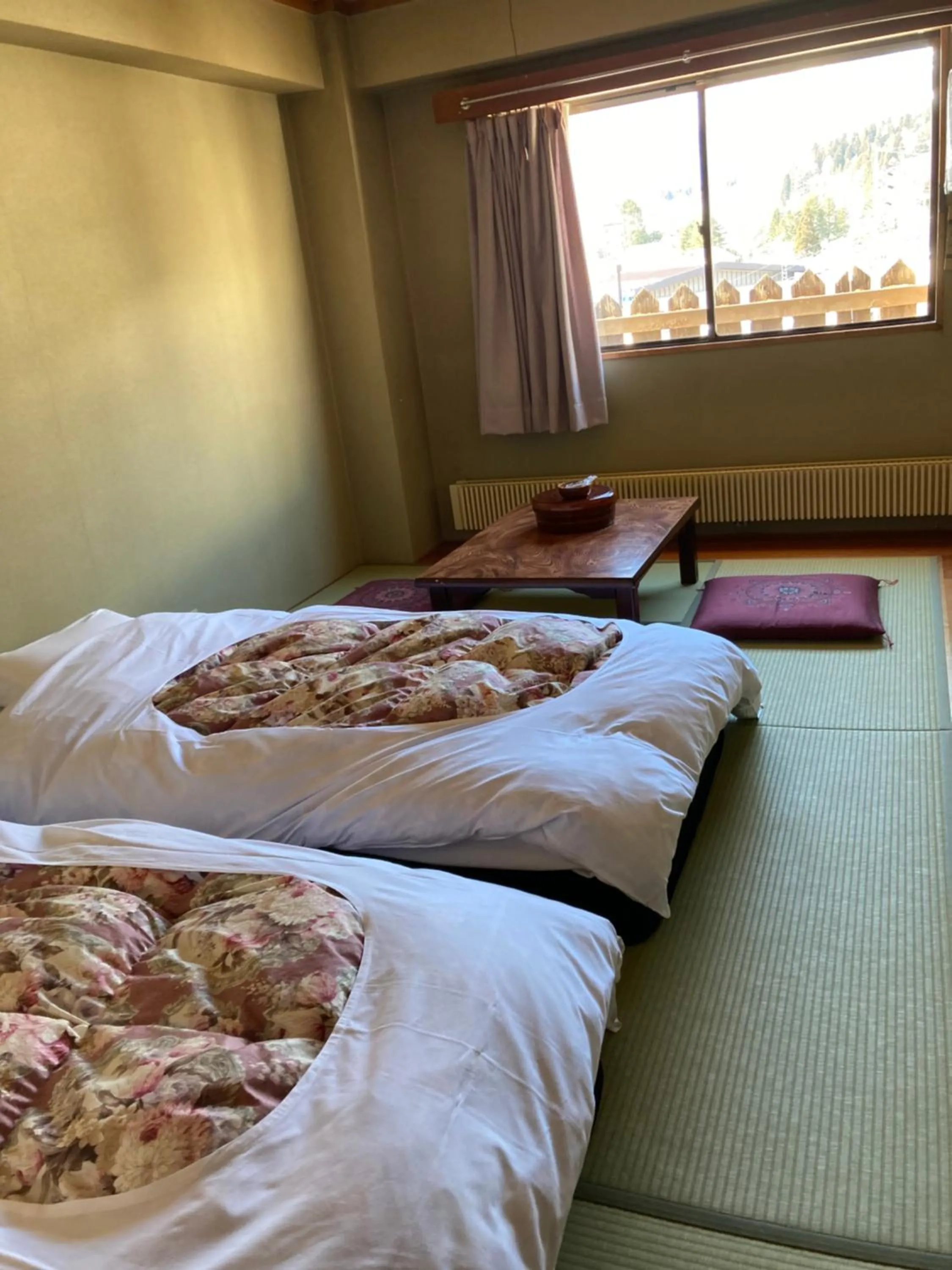 Bed in Resort Inn Seikan