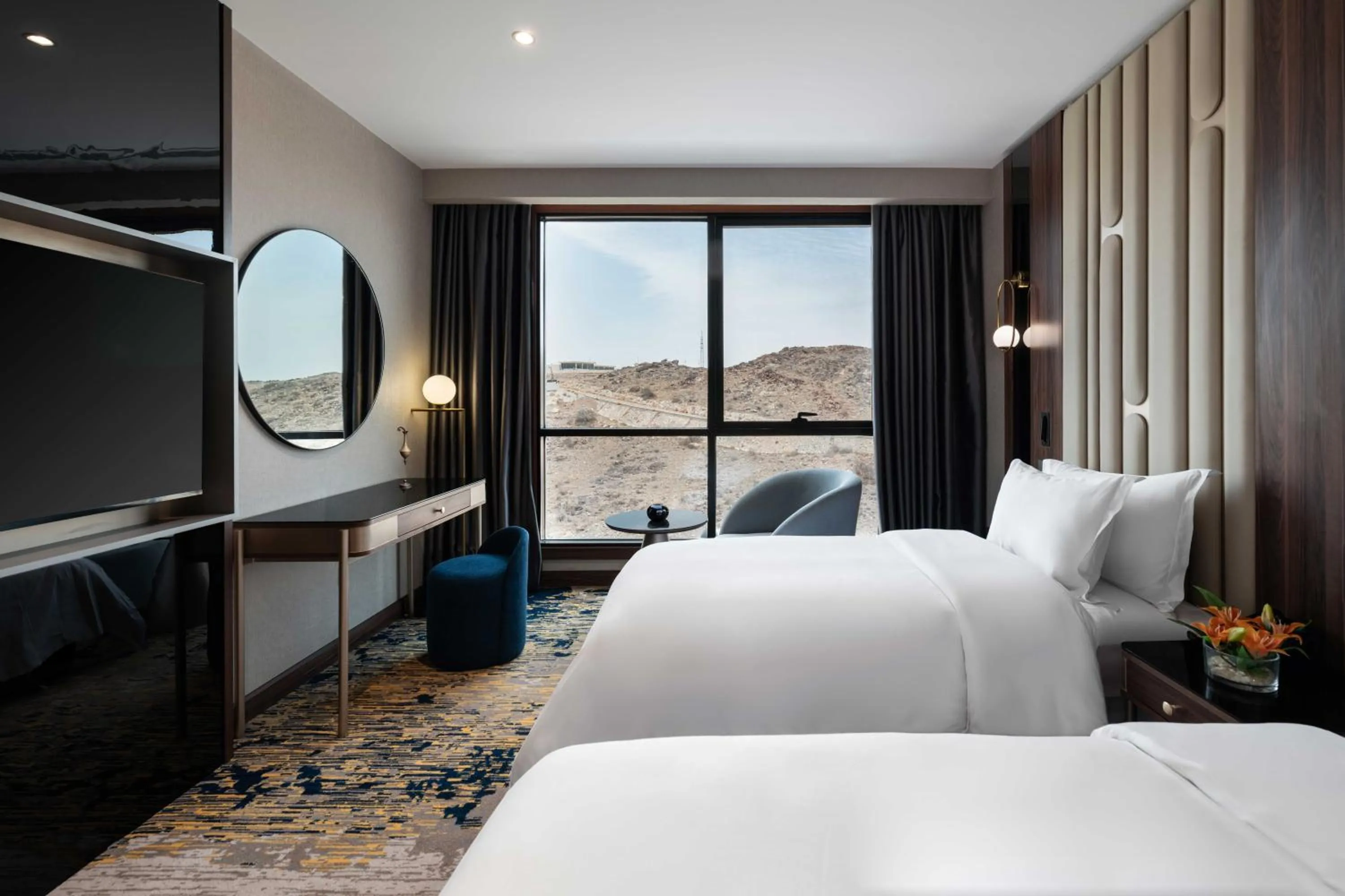 Photo of the whole room, Bed in Warwick Al Taif Hotel