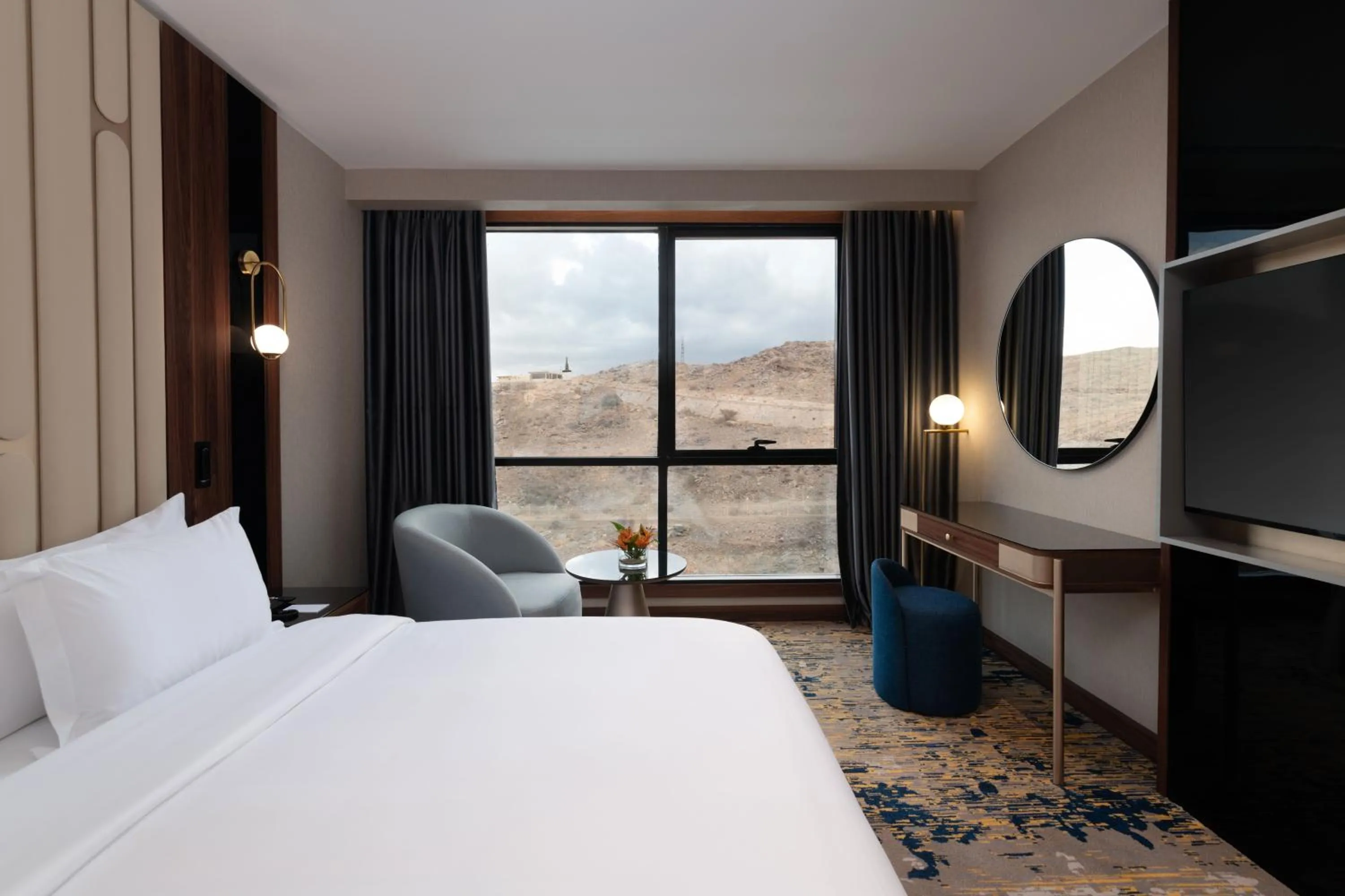 Photo of the whole room, Bed in Warwick Al Taif Hotel