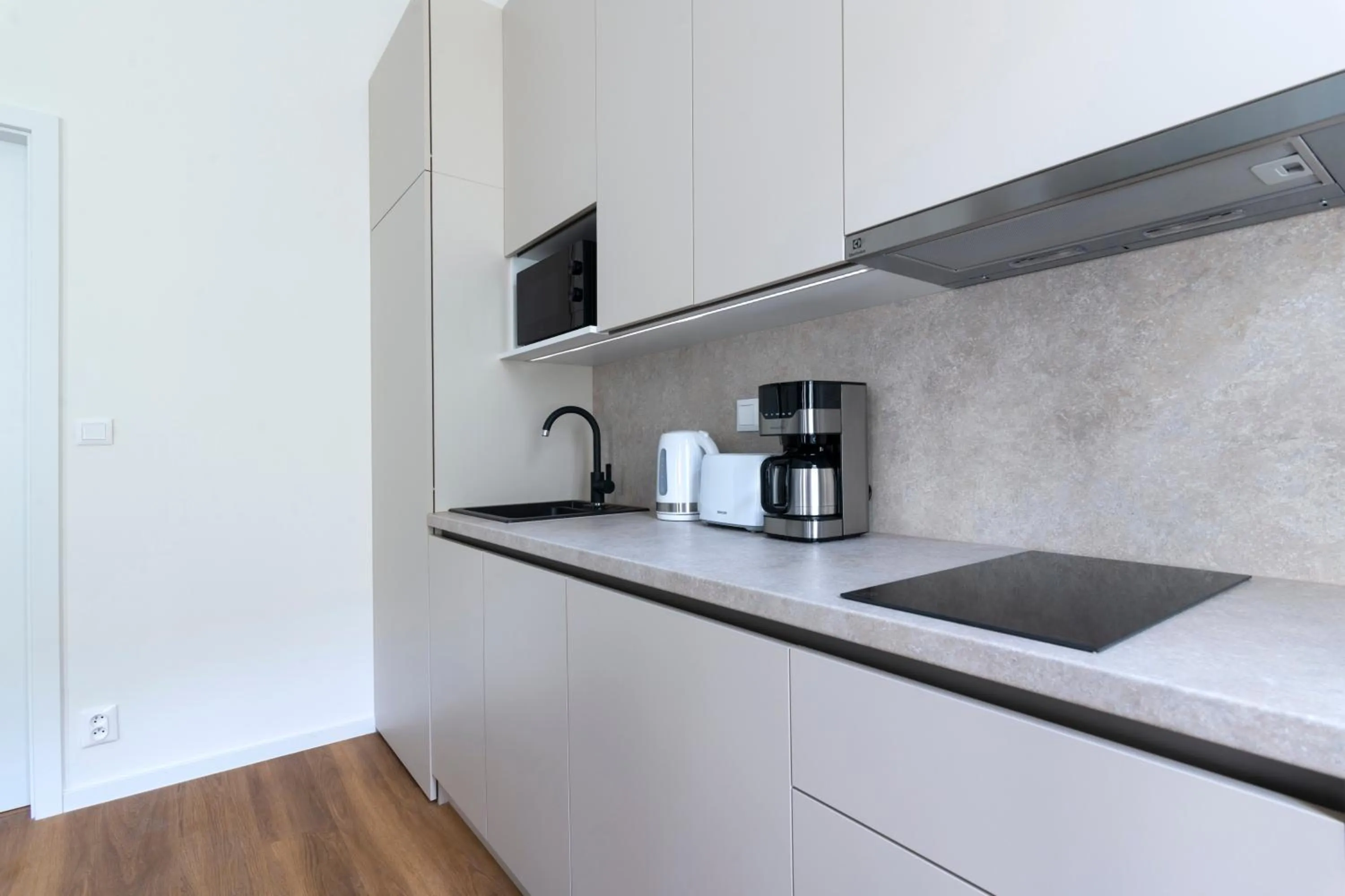Kitchen or kitchenette in Encore Boutique Residence by Dwellfort