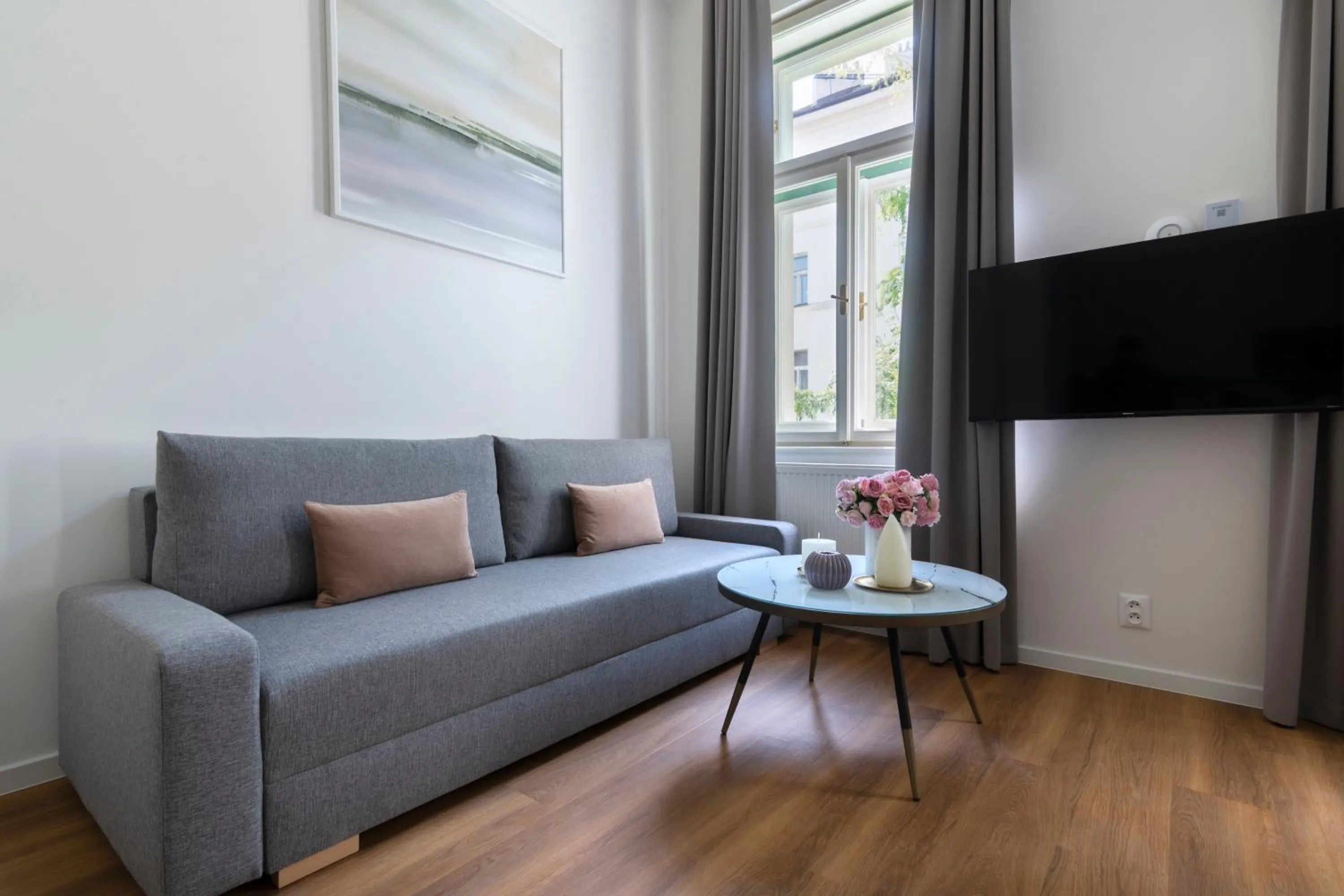 TV and multimedia in Encore Boutique Residence by Dwellfort