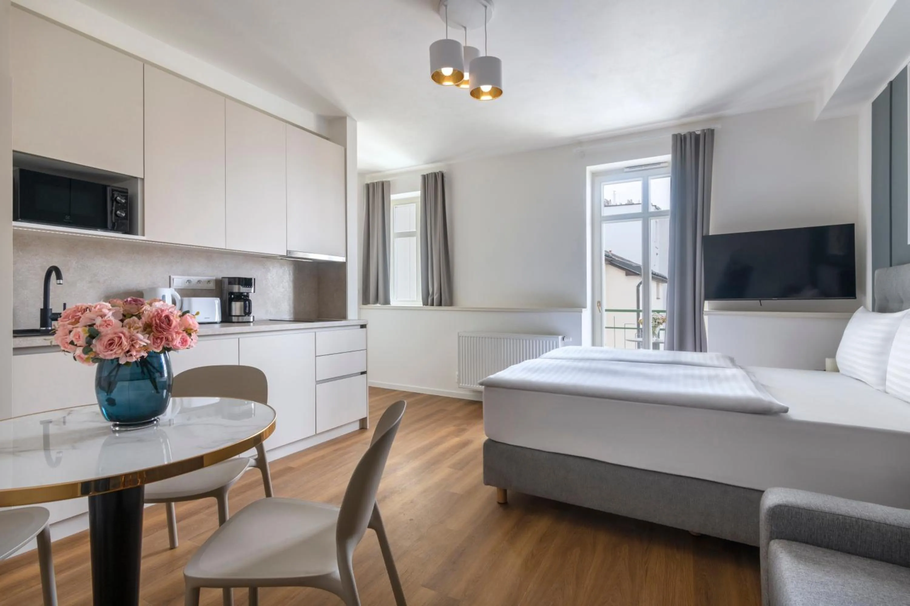 Bed in Encore Boutique Residence by Dwellfort