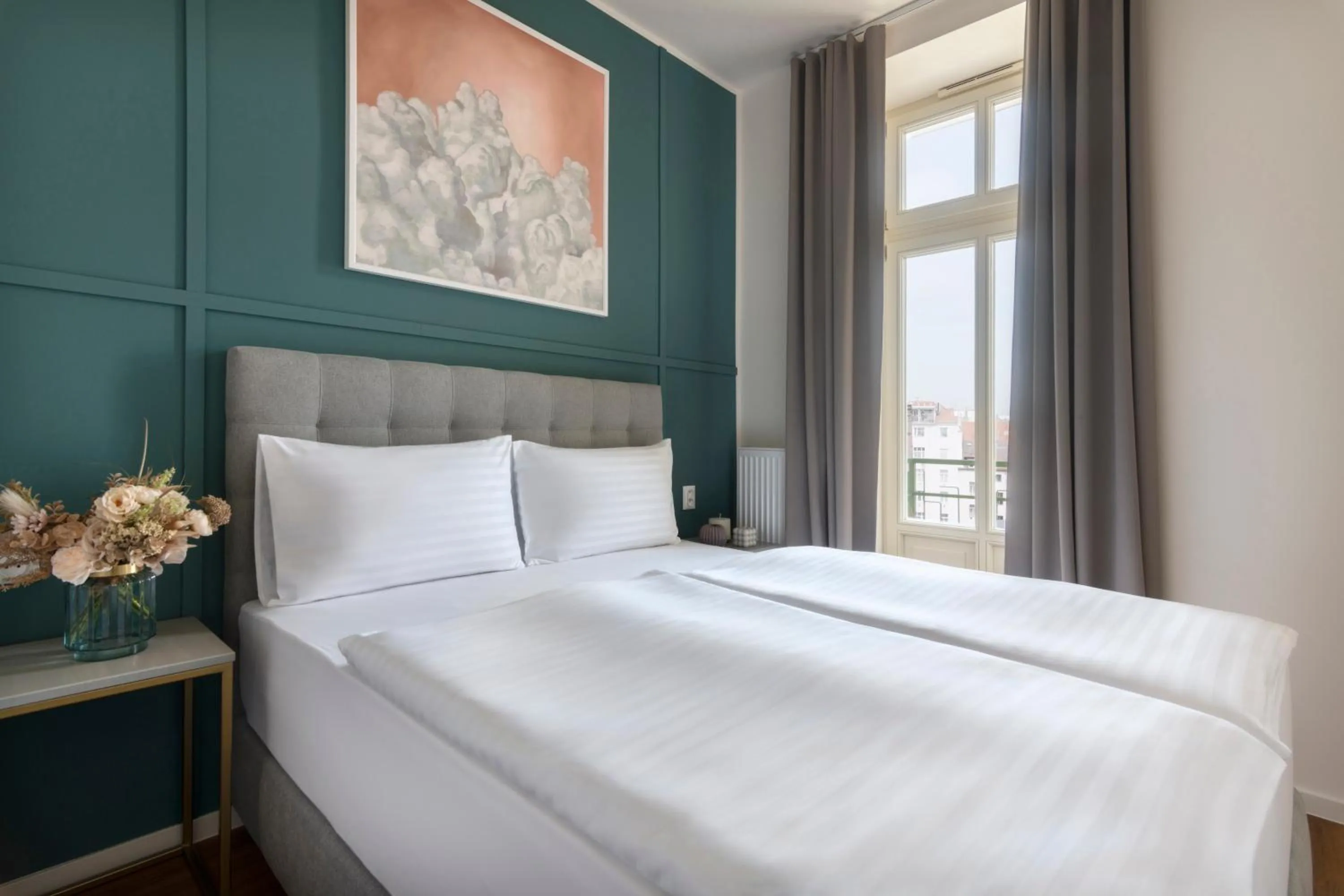 Bed in Encore Boutique Residence by Dwellfort