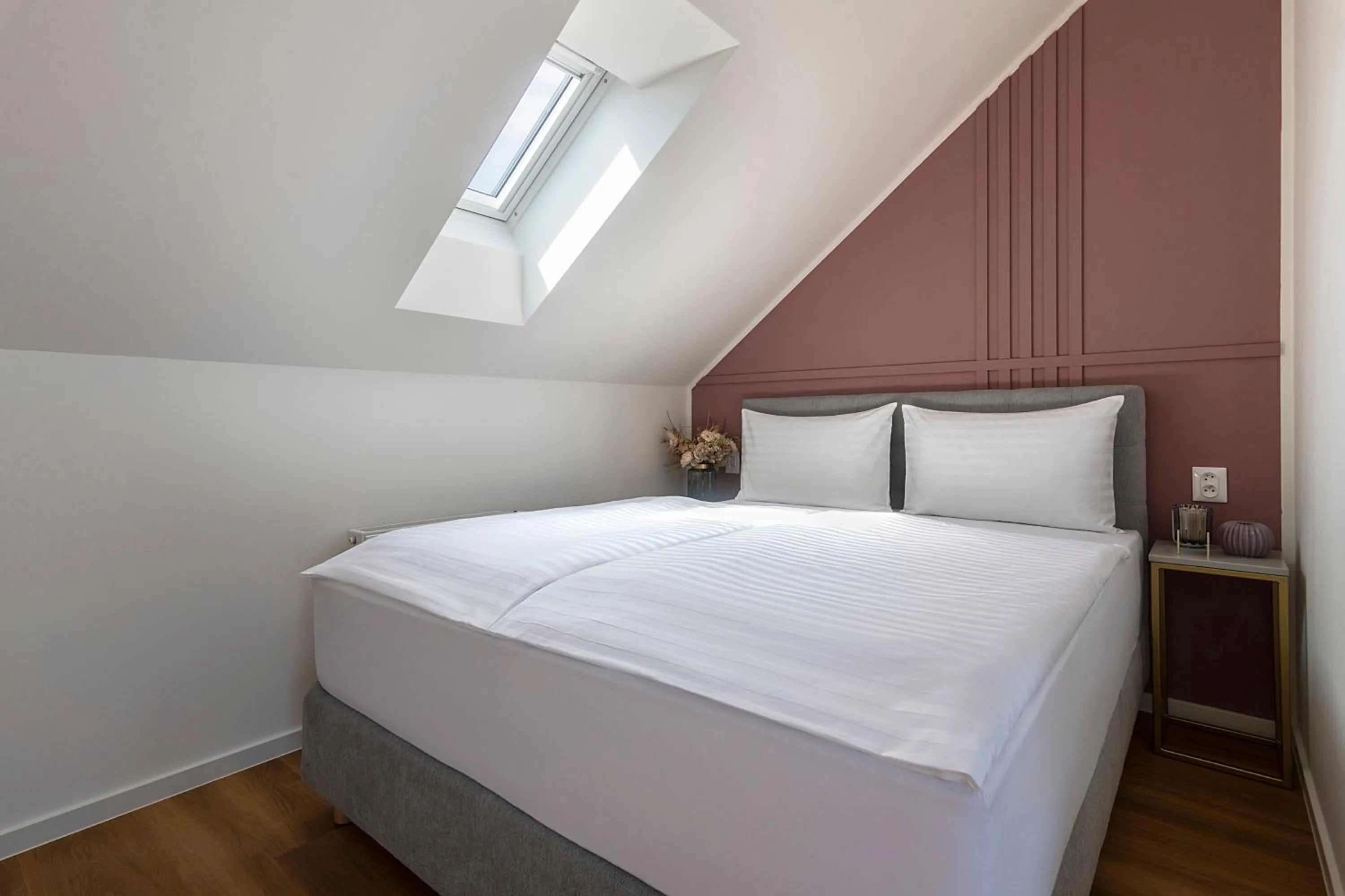 Bed in Encore Boutique Residence by Dwellfort