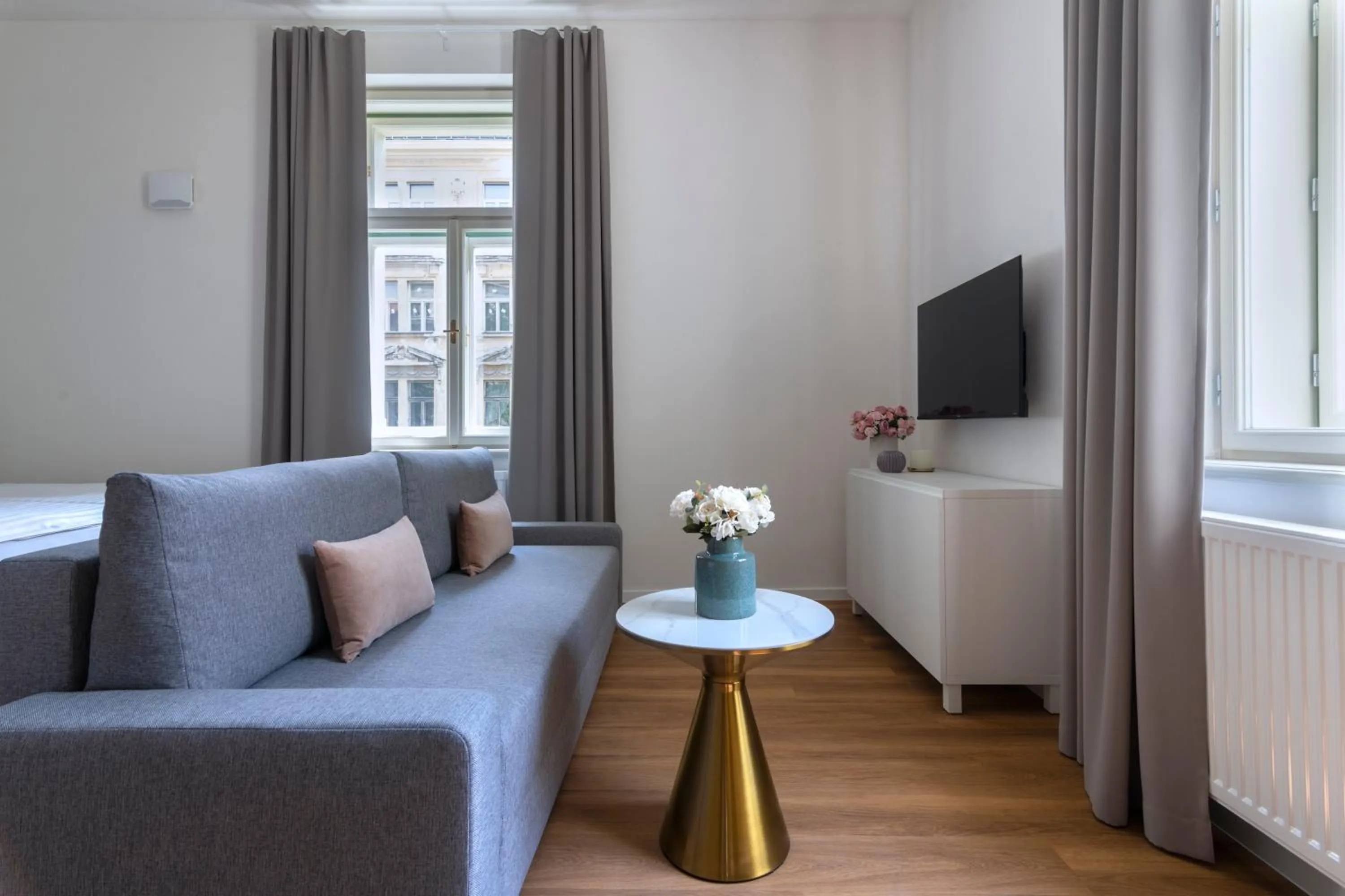 Seating area in Encore Boutique Residence by Dwellfort