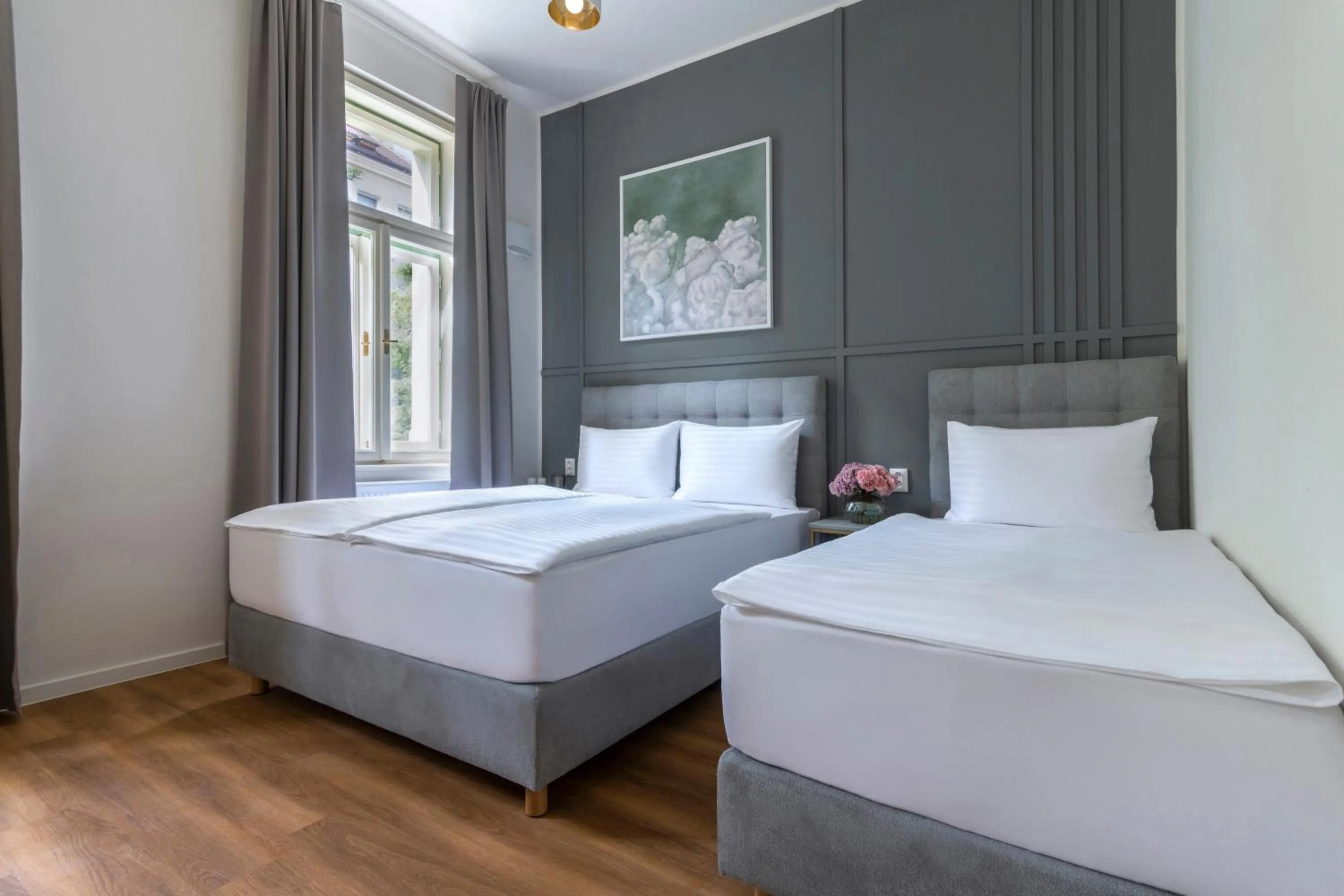 Bed in Encore Boutique Residence by Dwellfort