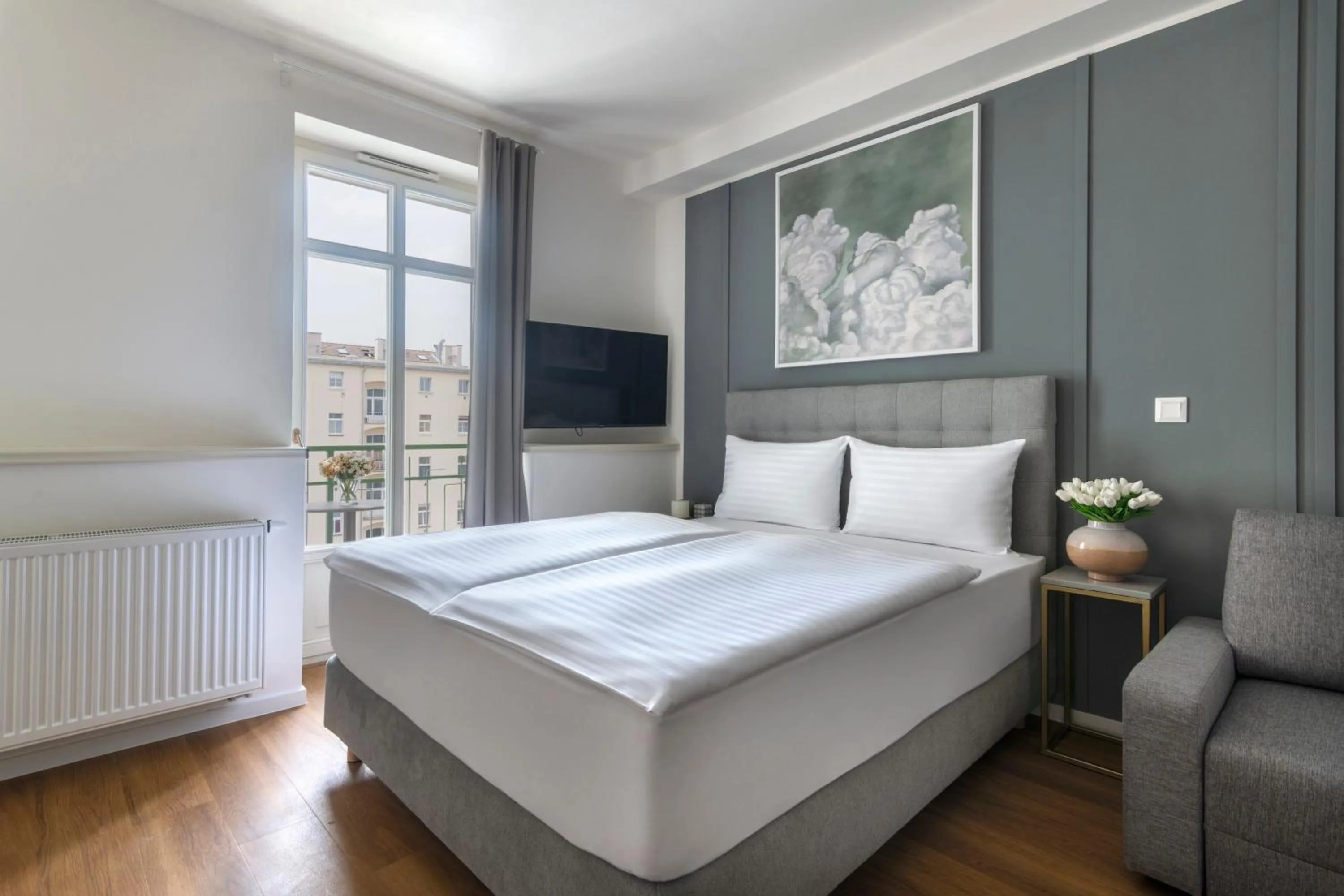 Bed in Encore Boutique Residence by Dwellfort