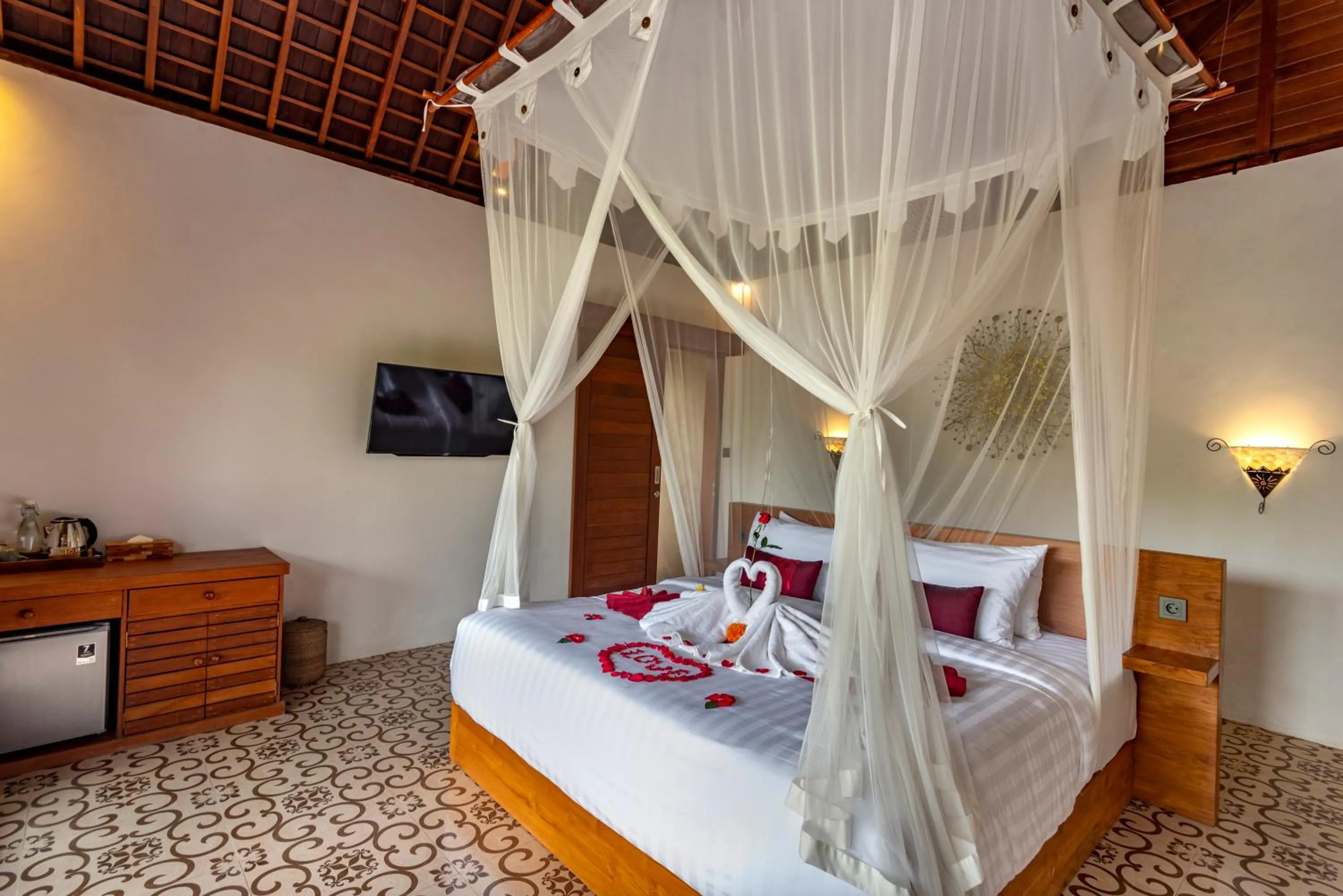 Communal lounge/ TV room, Bed in Tiare Villa Ubud by Dhananjaya Hospitality