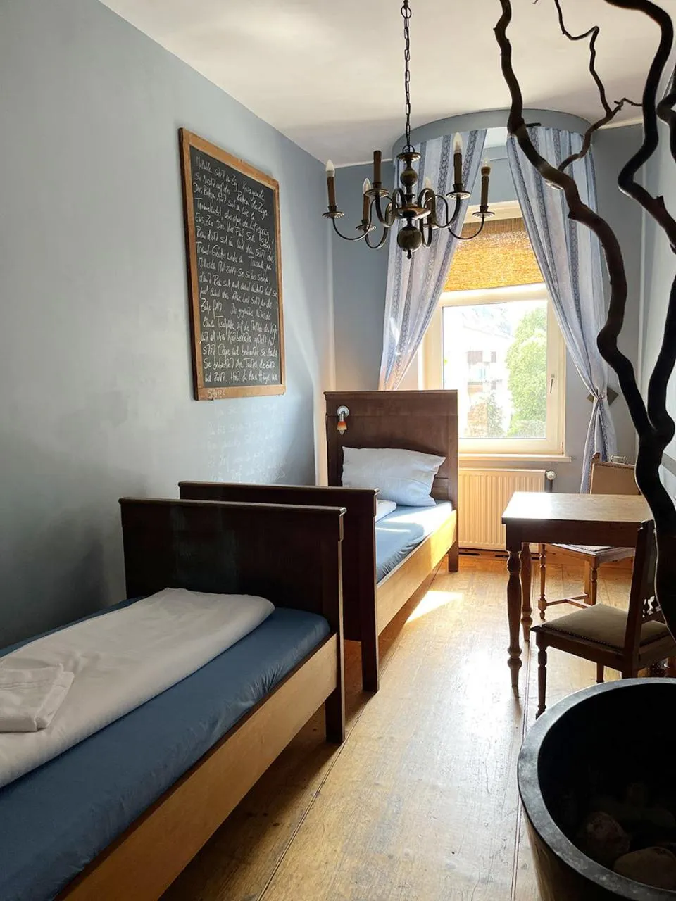 Living room, Bed in Homeplanet Hostel