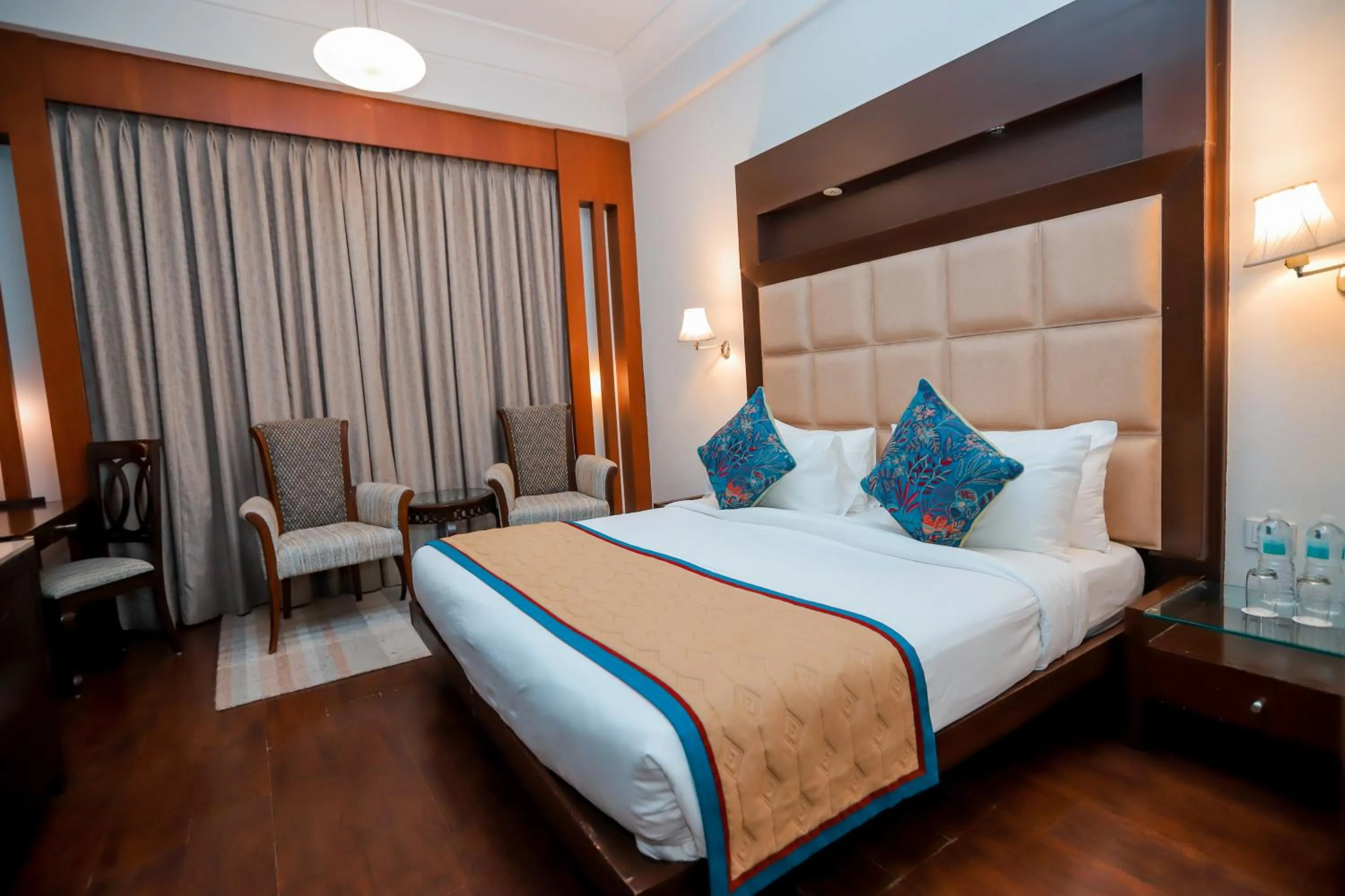 Photo of the whole room, Bed in Bel-La Monde Hotel NH8 at 6km from IGI Airport Delhi