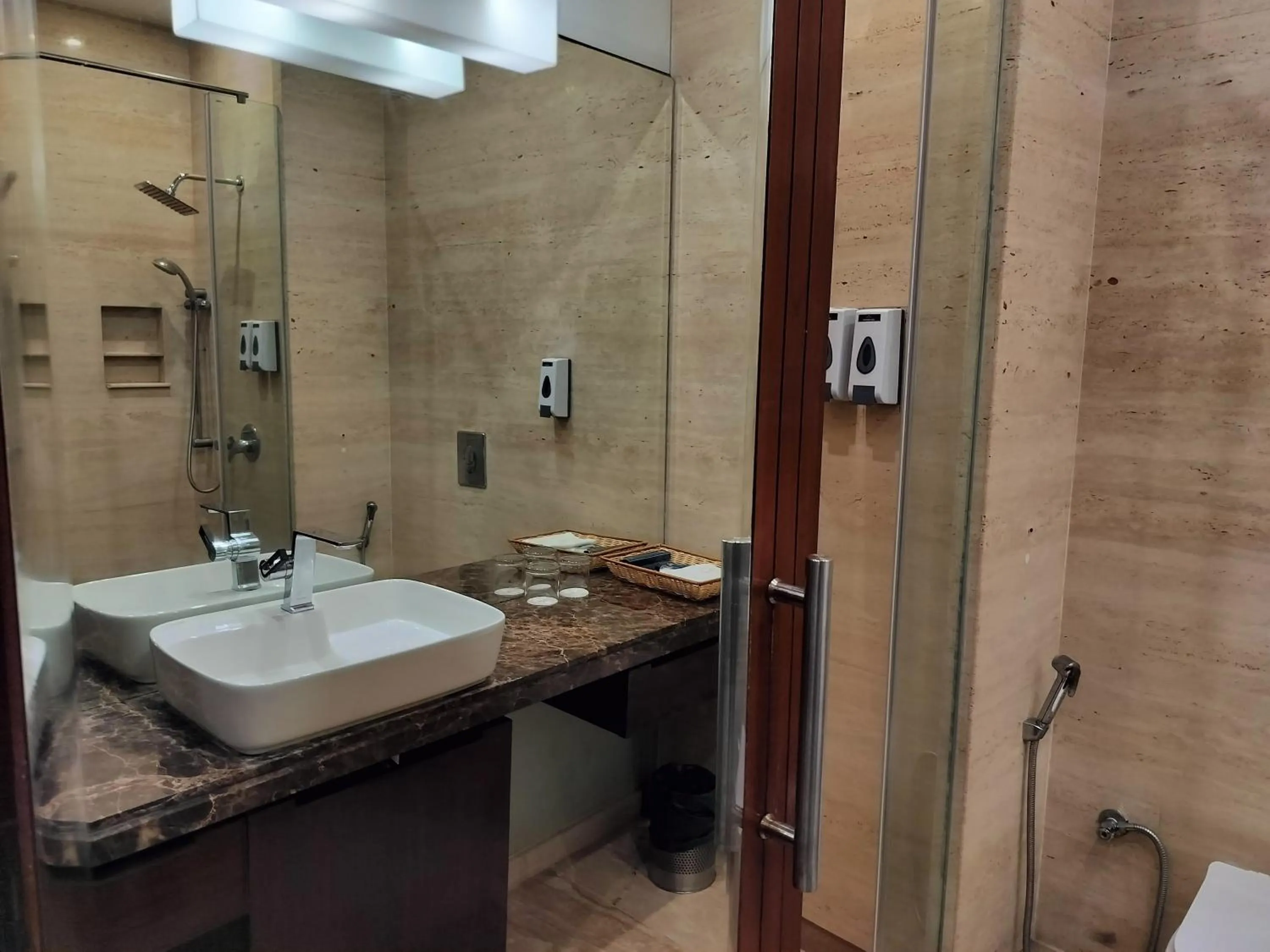 Bathroom in Bel-La Monde Hotel NH8 at 6km from IGI Airport Delhi