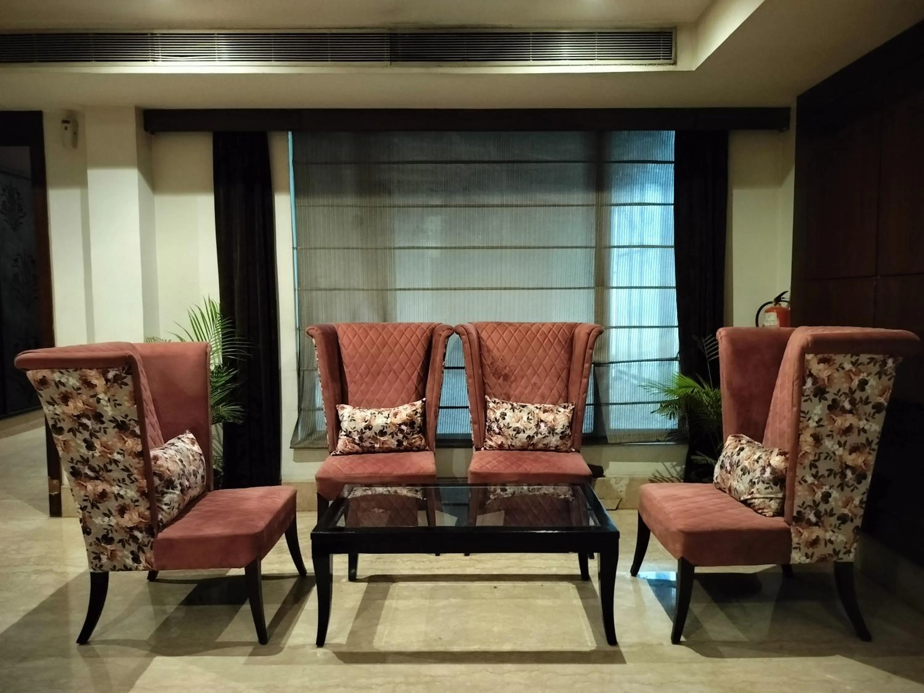 Communal lounge/ TV room in Bel-La Monde Hotel NH8 at 6km from IGI Airport Delhi