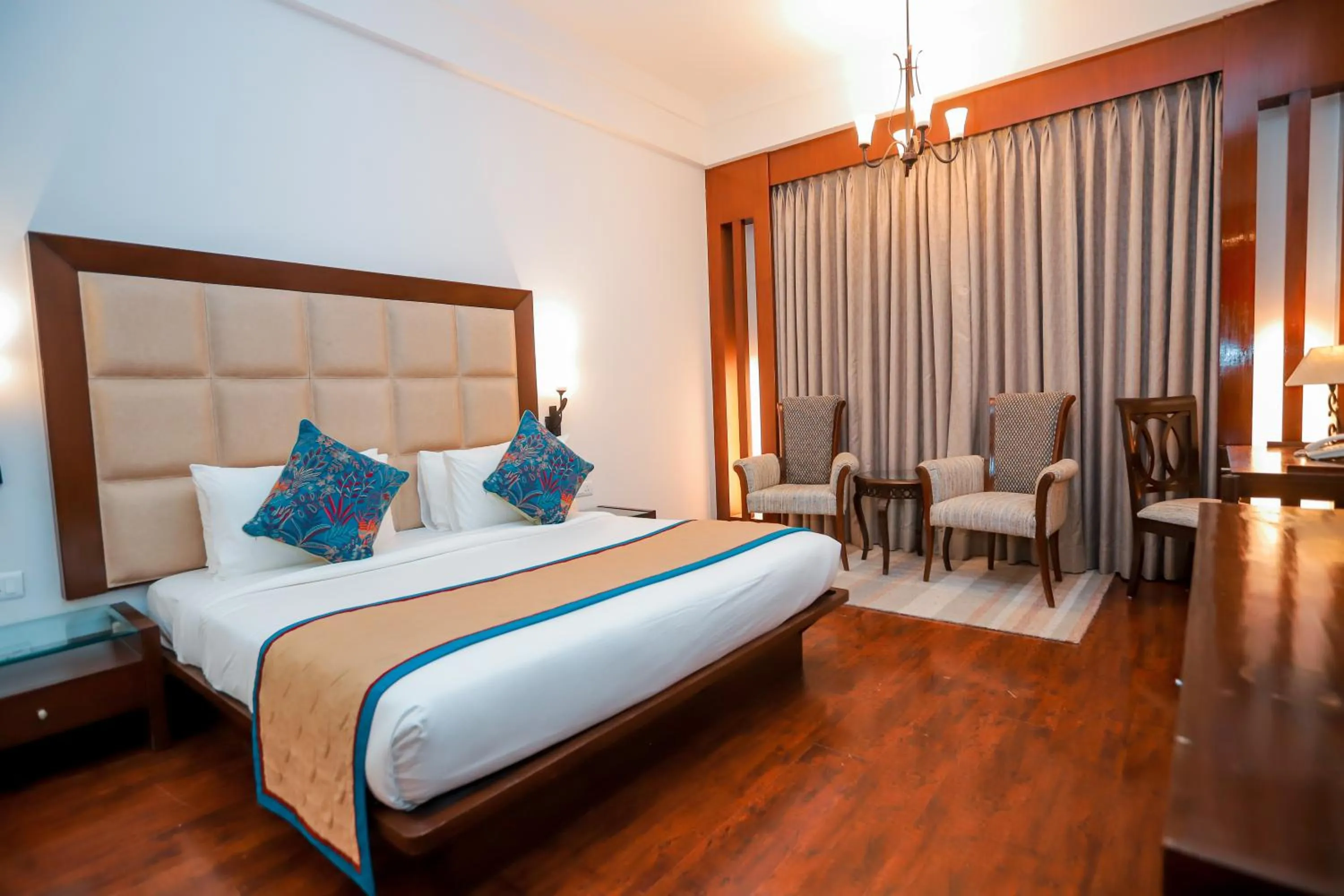 Photo of the whole room, Bed in Bel-La Monde Hotel NH8 at 6km from IGI Airport Delhi