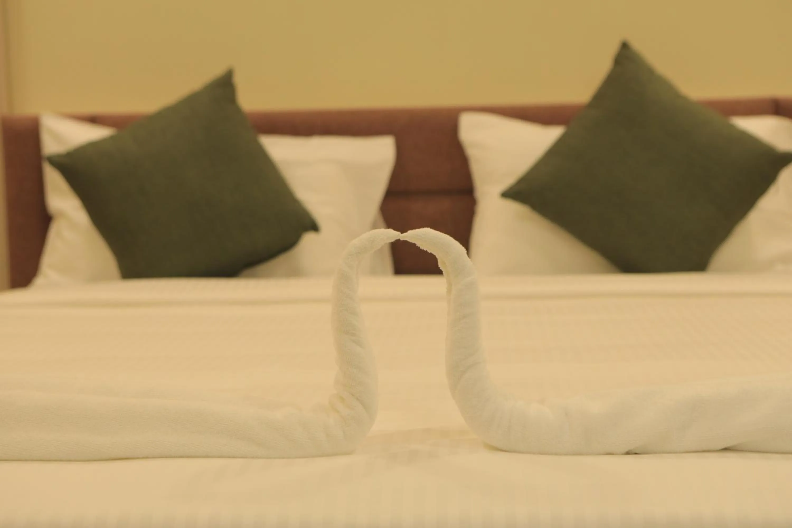 Bed in KANS ONE - Hotel & Banquets