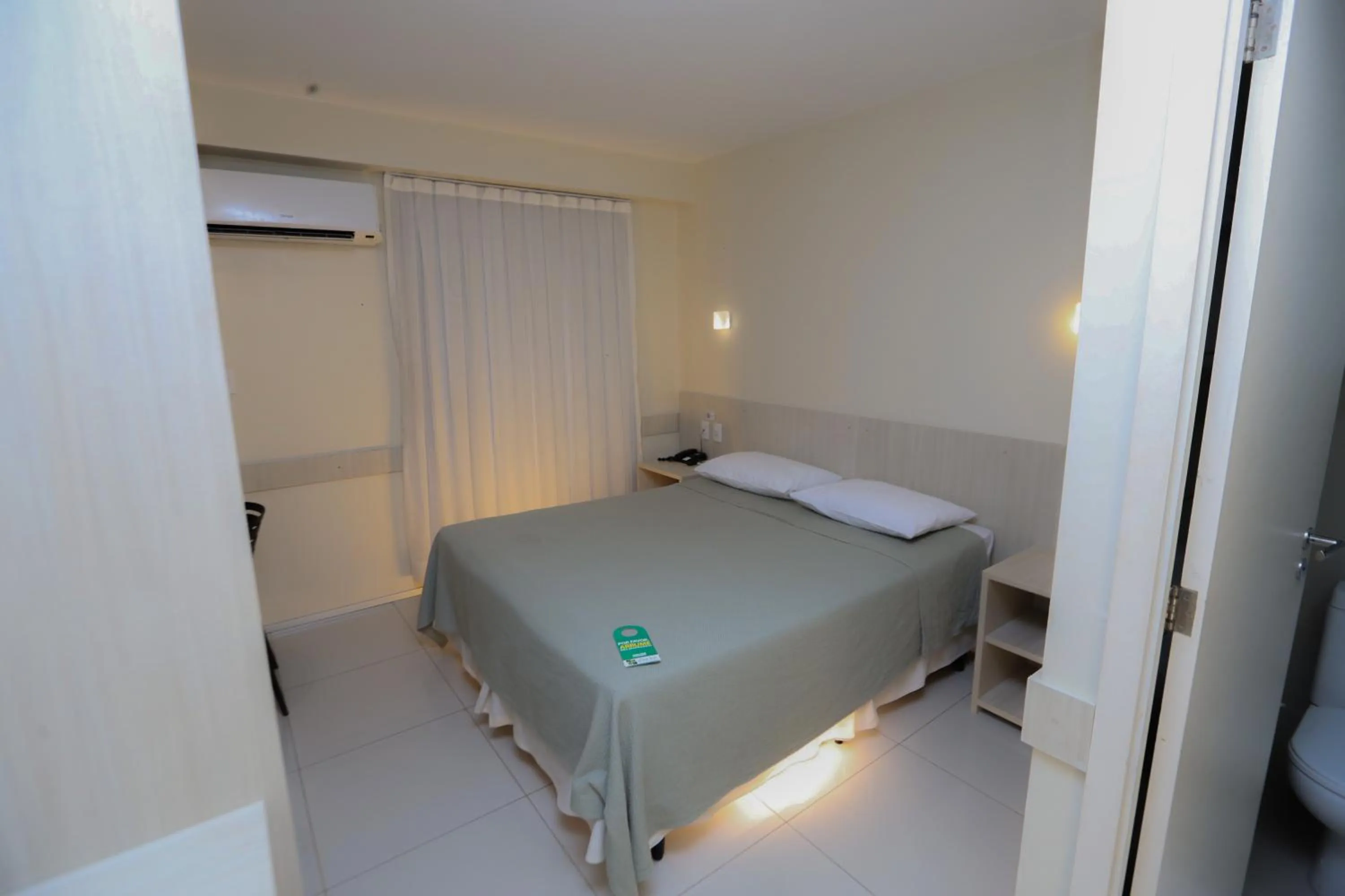 Bed in Stay Inn Hotel