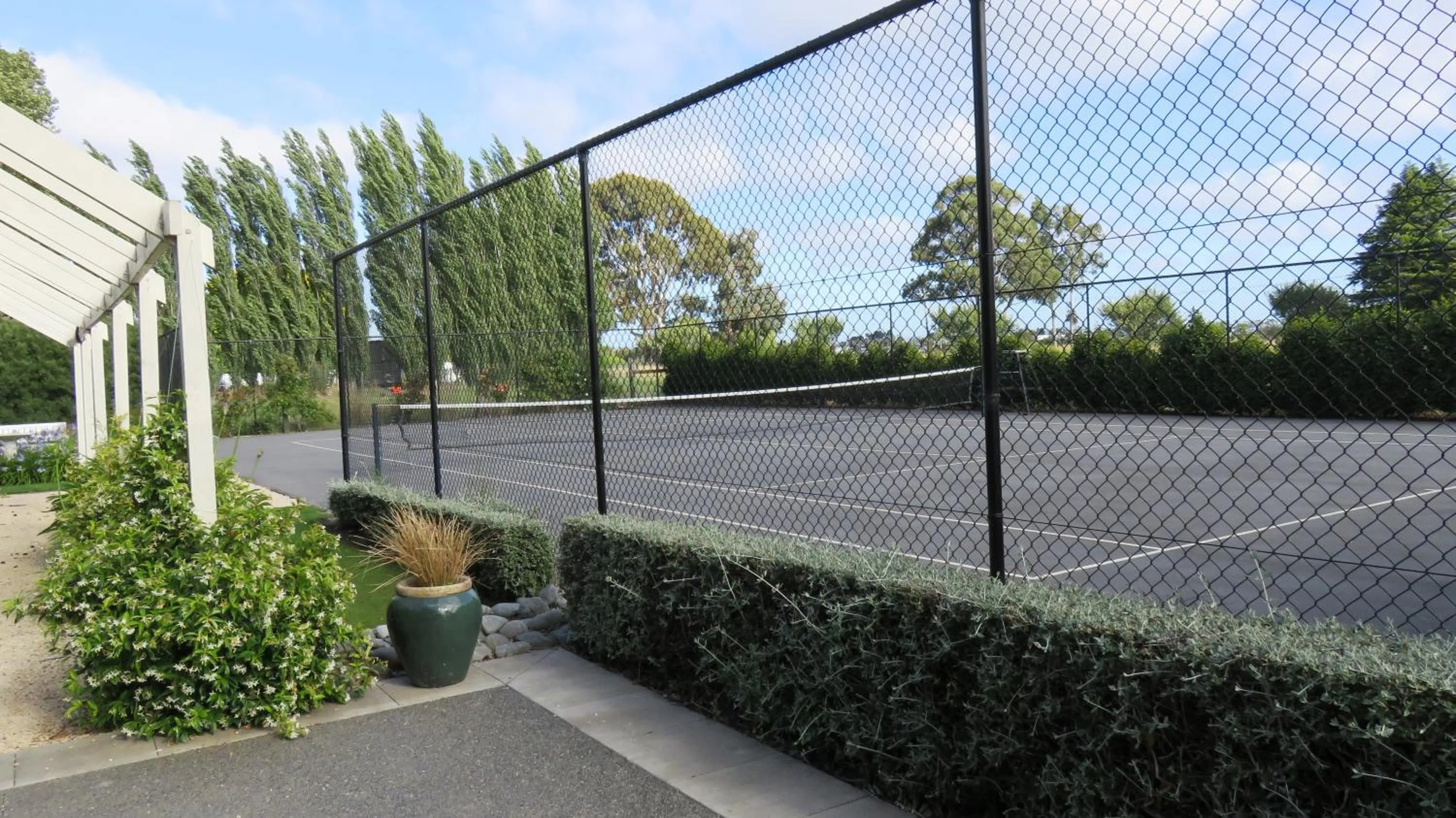 Tennis court in Maples on Harewood