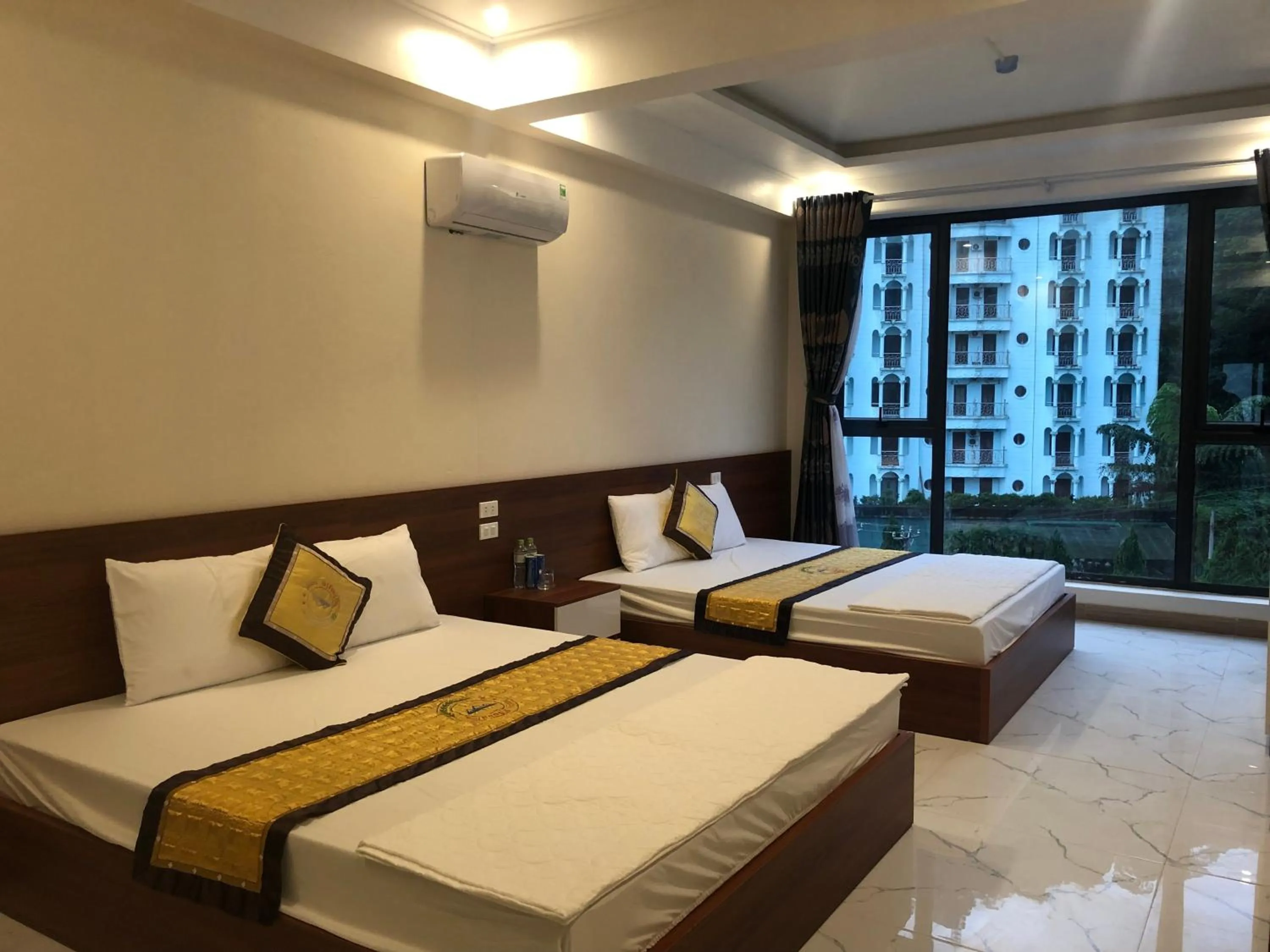 Bed in Thang Loi Tam Dao Hotel