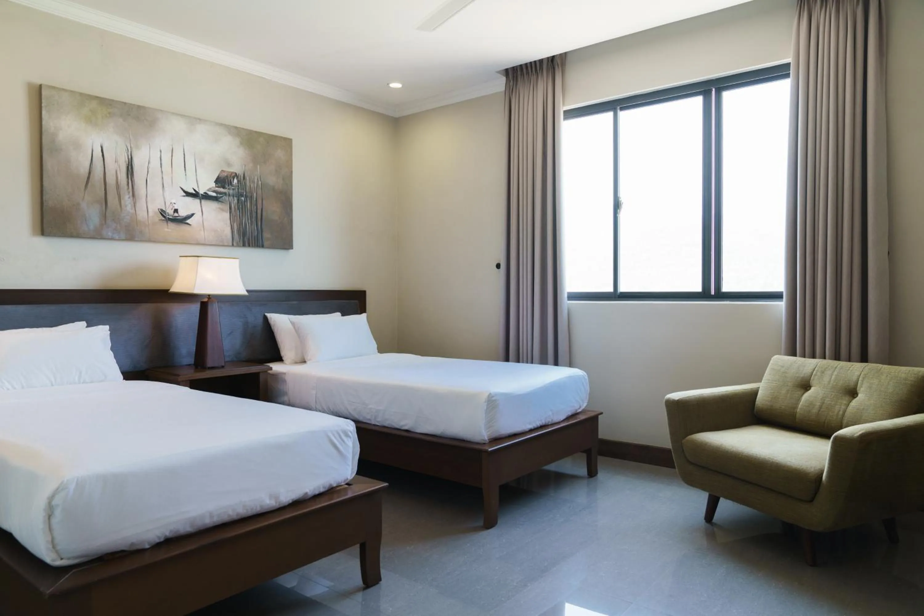 Bed in Dan Oasis Hotel and Apartment