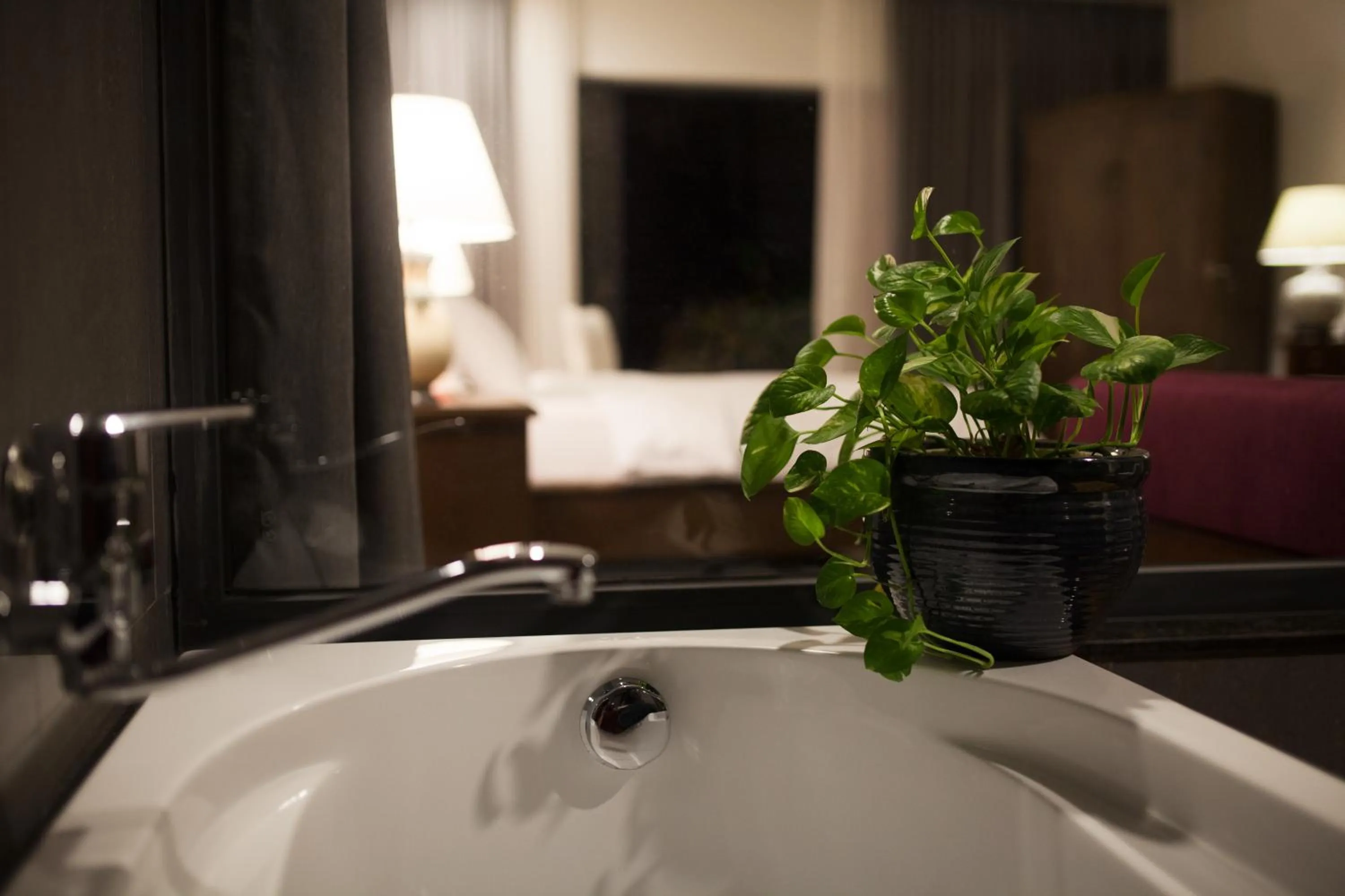 Bathroom in Dan Oasis Hotel and Apartment
